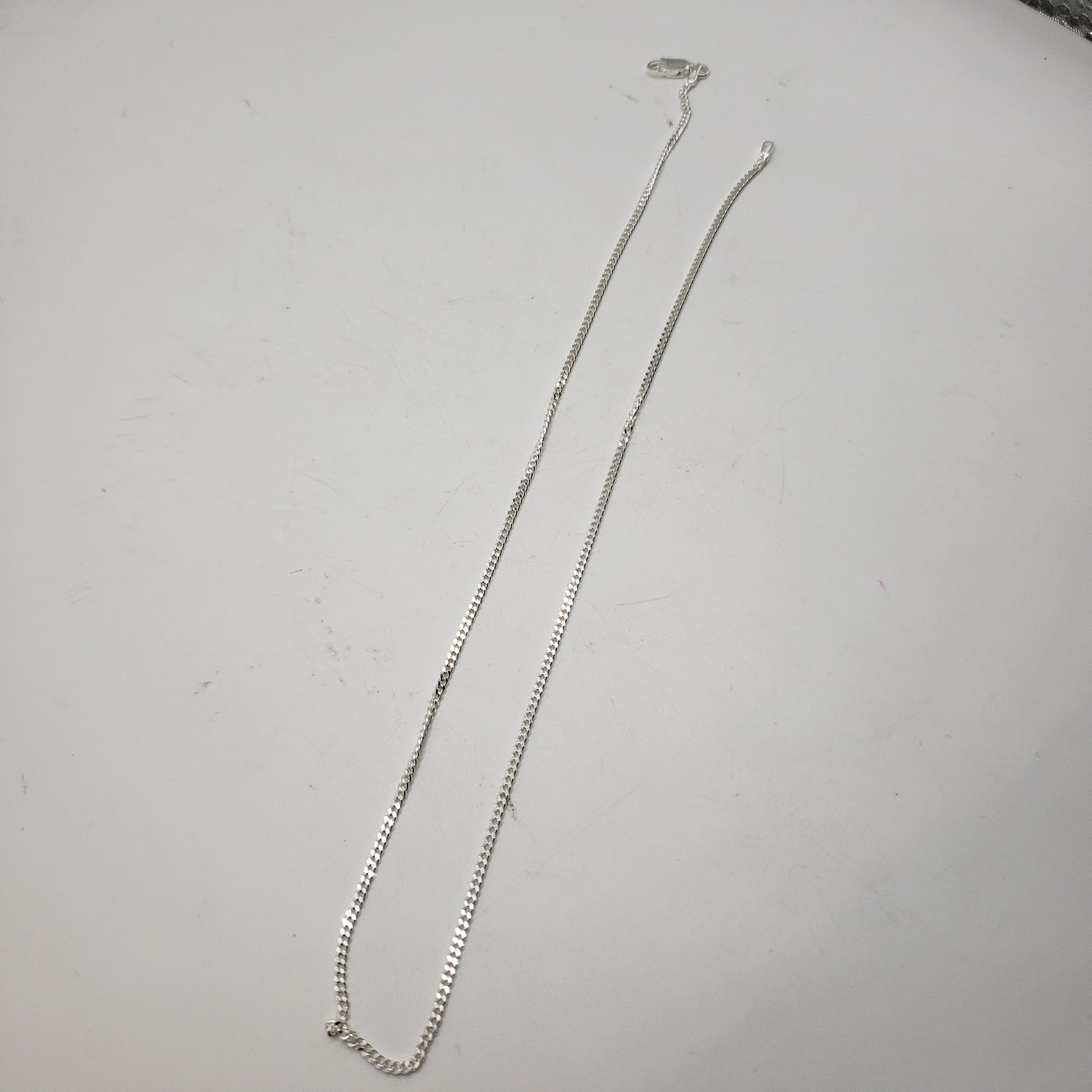 16 Inch Long Sterling Silver Thin Figaro Chain.