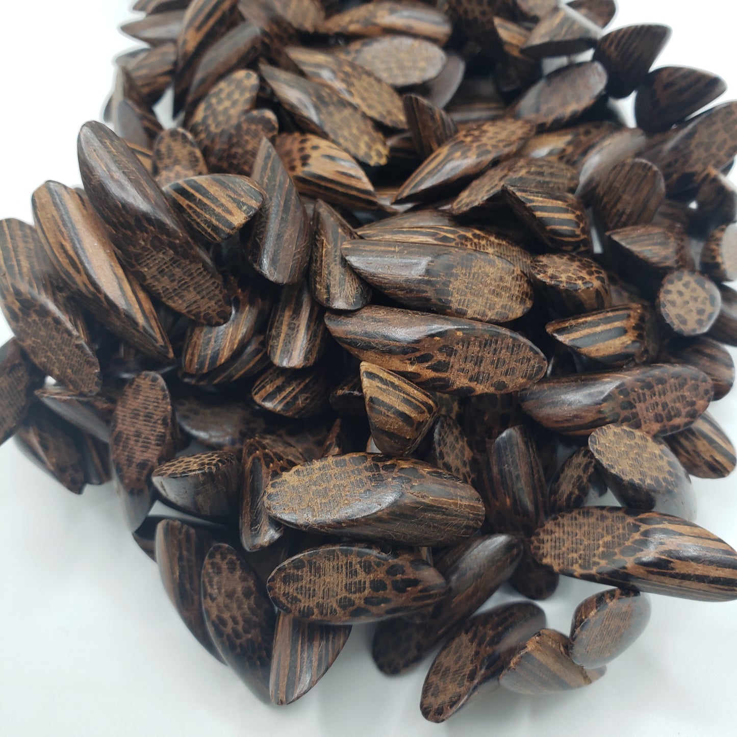 Dark Wood Carved Pointed