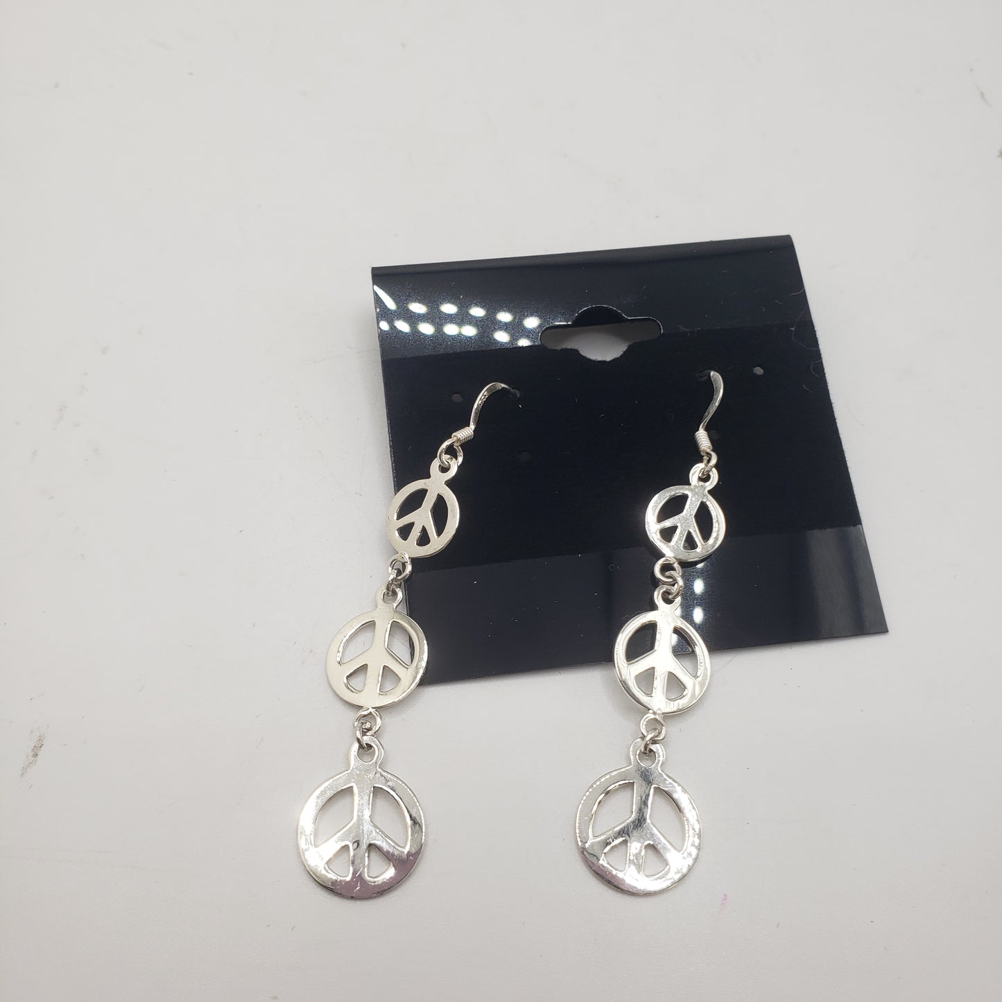 SS Peace Sign Earrings 18.99