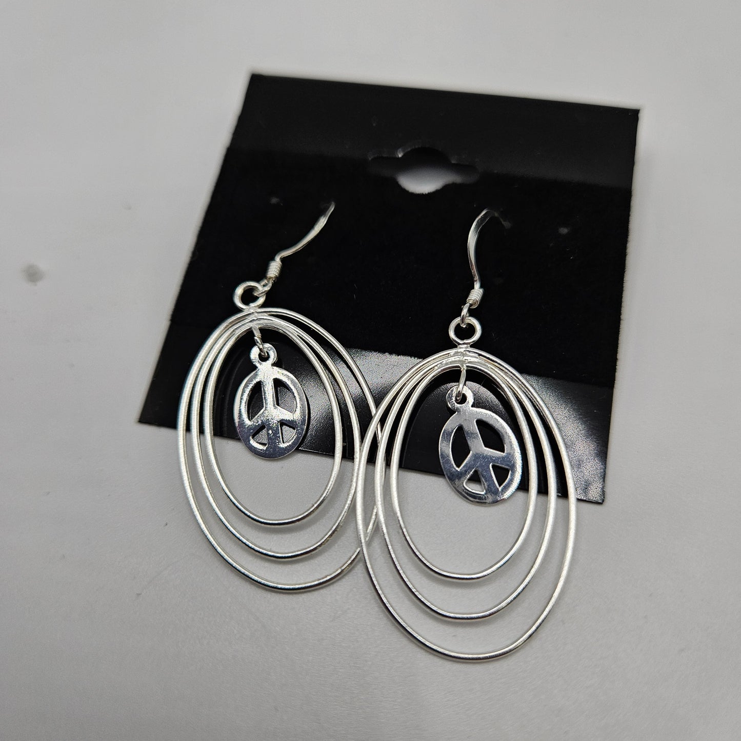 SS Peace Sign Earrings 28.99