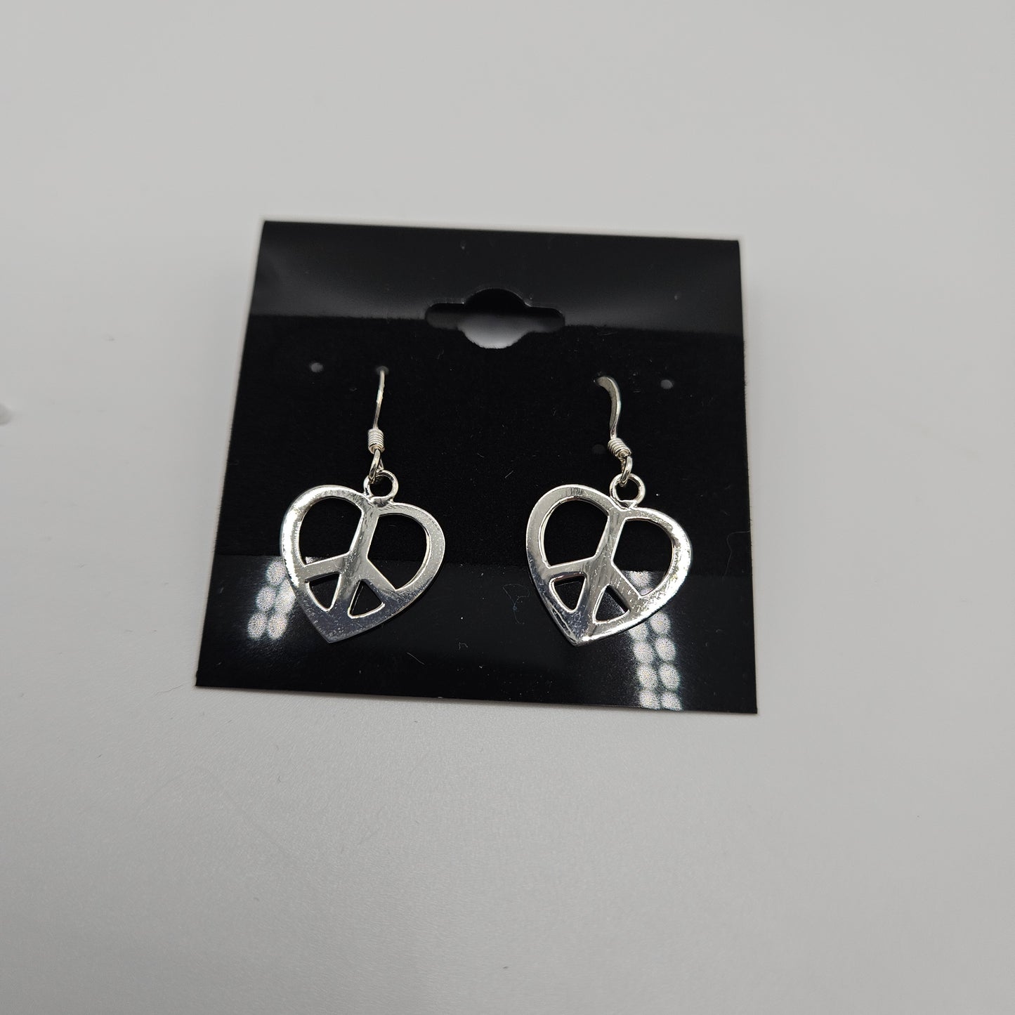 SS Heart Peace Sign Earrings 11.99