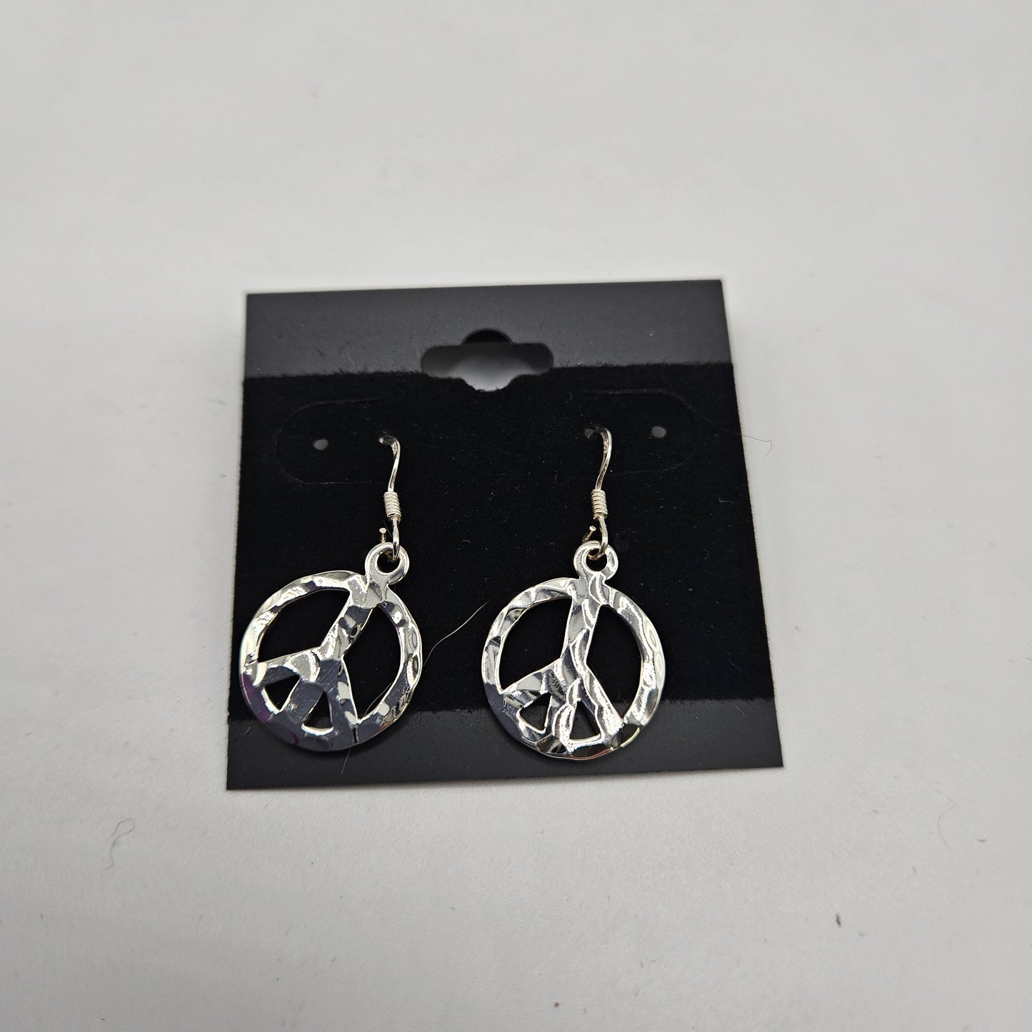 SS Peace Sign Earrings 33.99