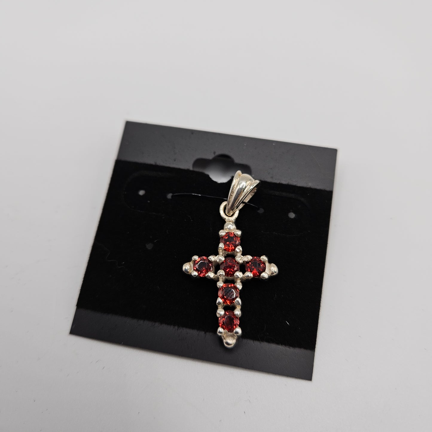 SS Garnet Cross Pendant 44.99