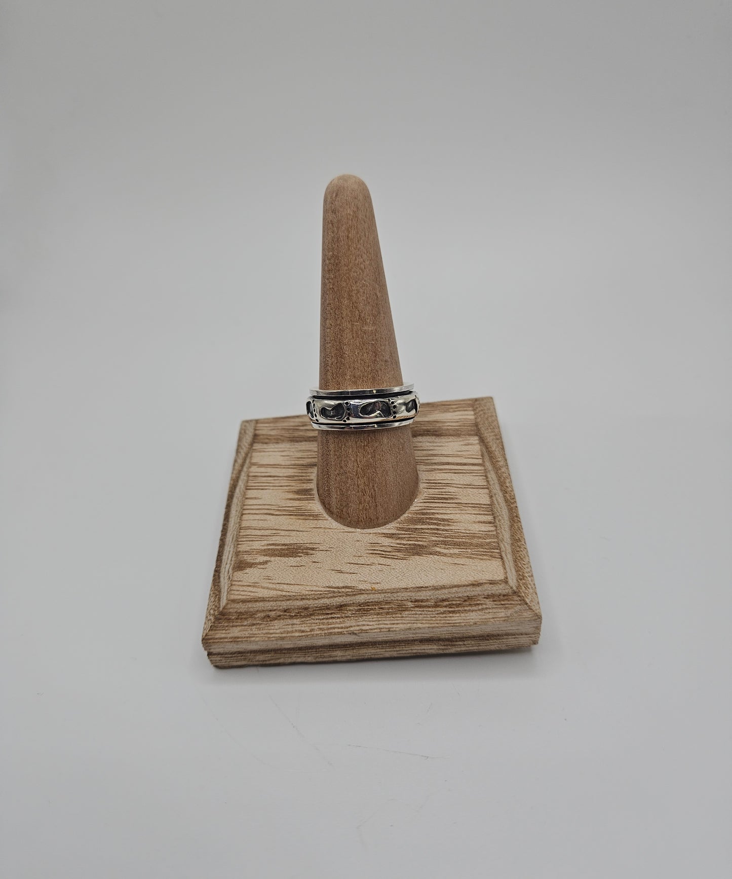 SS Spinning Footprint Ring 56.99