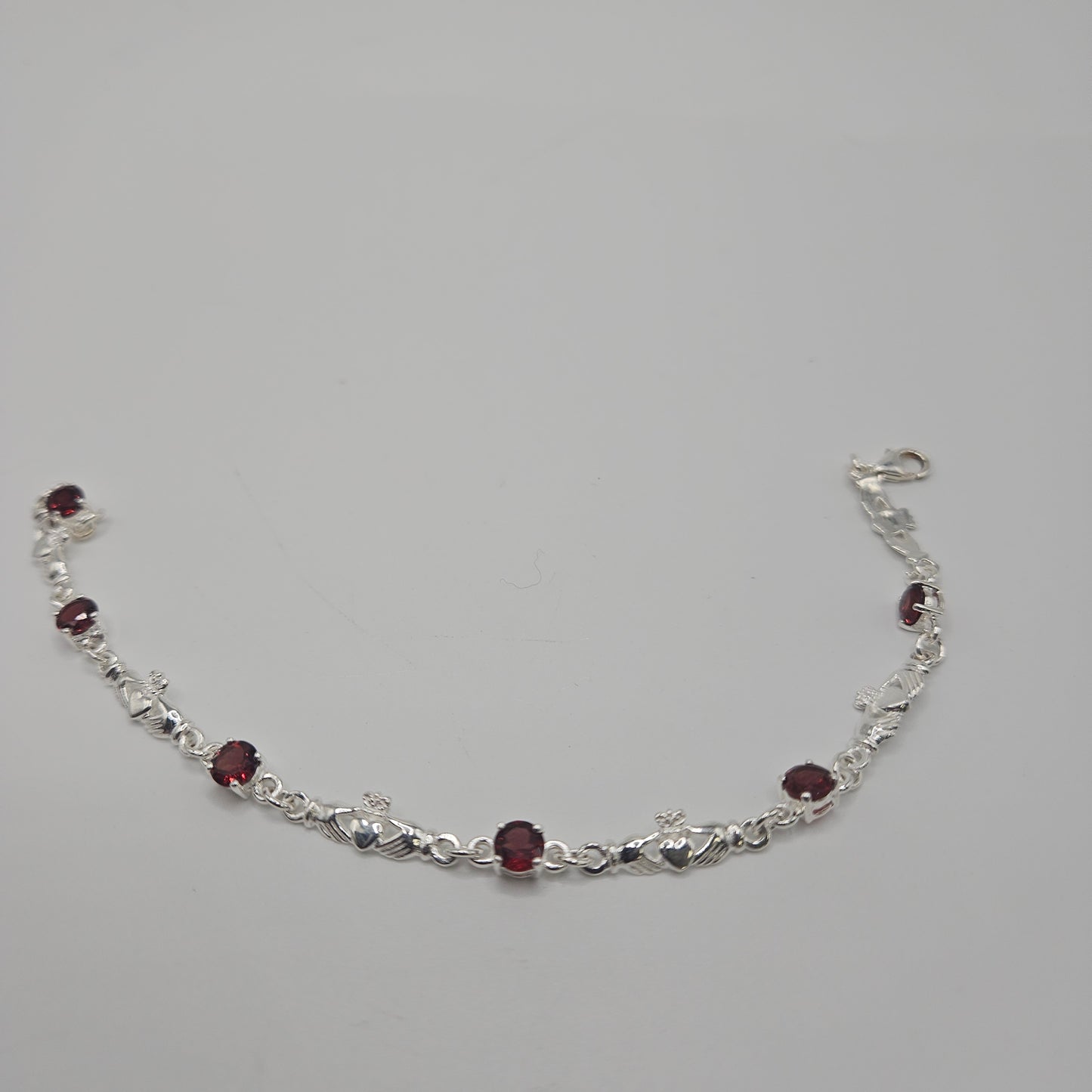 SS Garnet Hands & Heart Bracelet 89.99