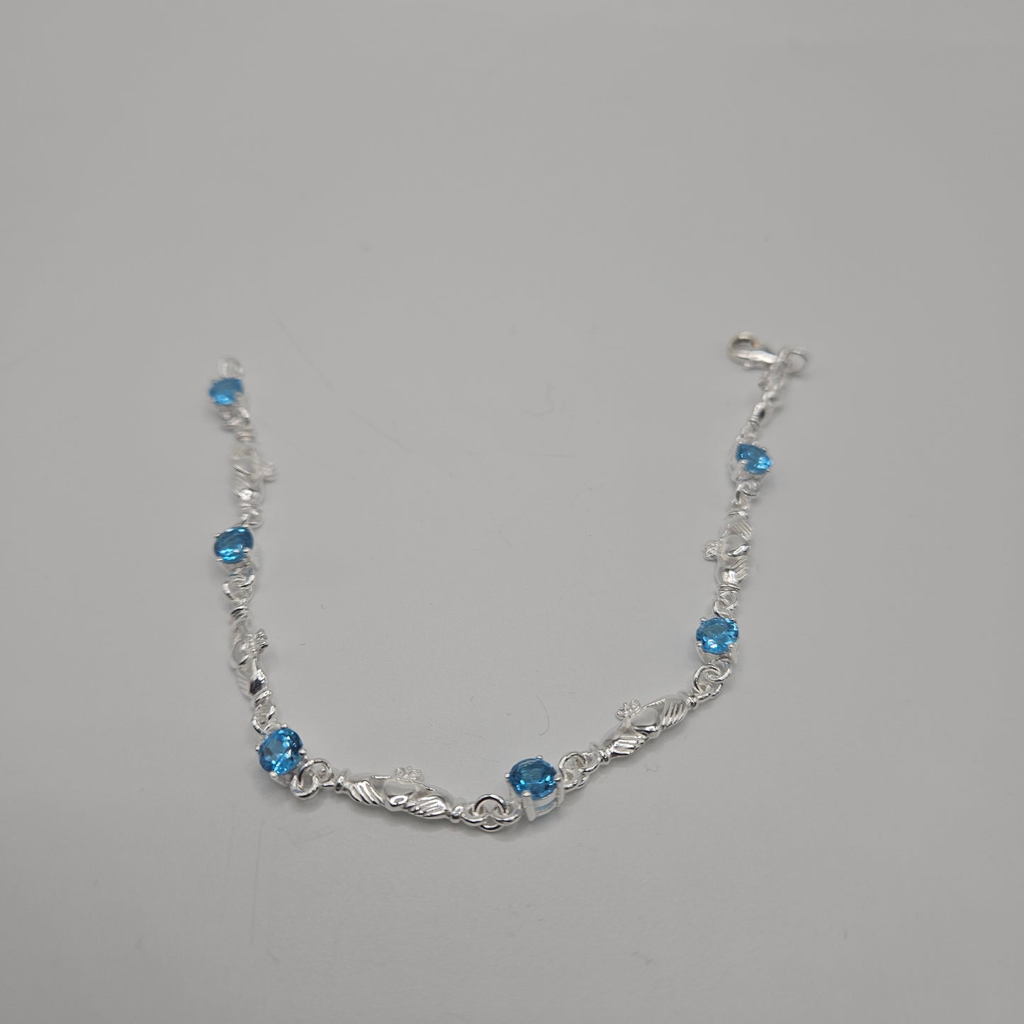 SS Blue Topaz Hands & Heart Bracelet 112.99
