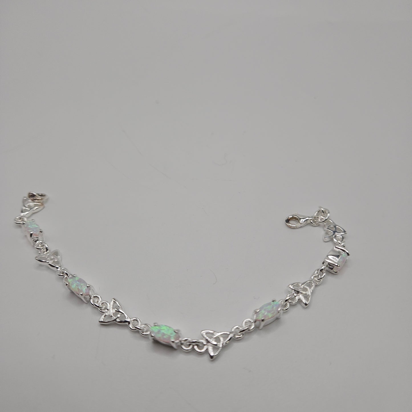 SS Opal Trinity Knot Bracelet 99.99