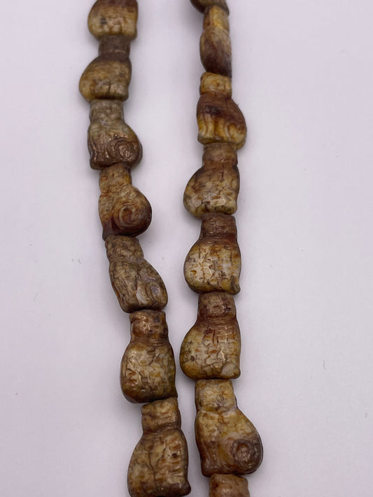 17mm Brown Cat Czech Bead Strand.