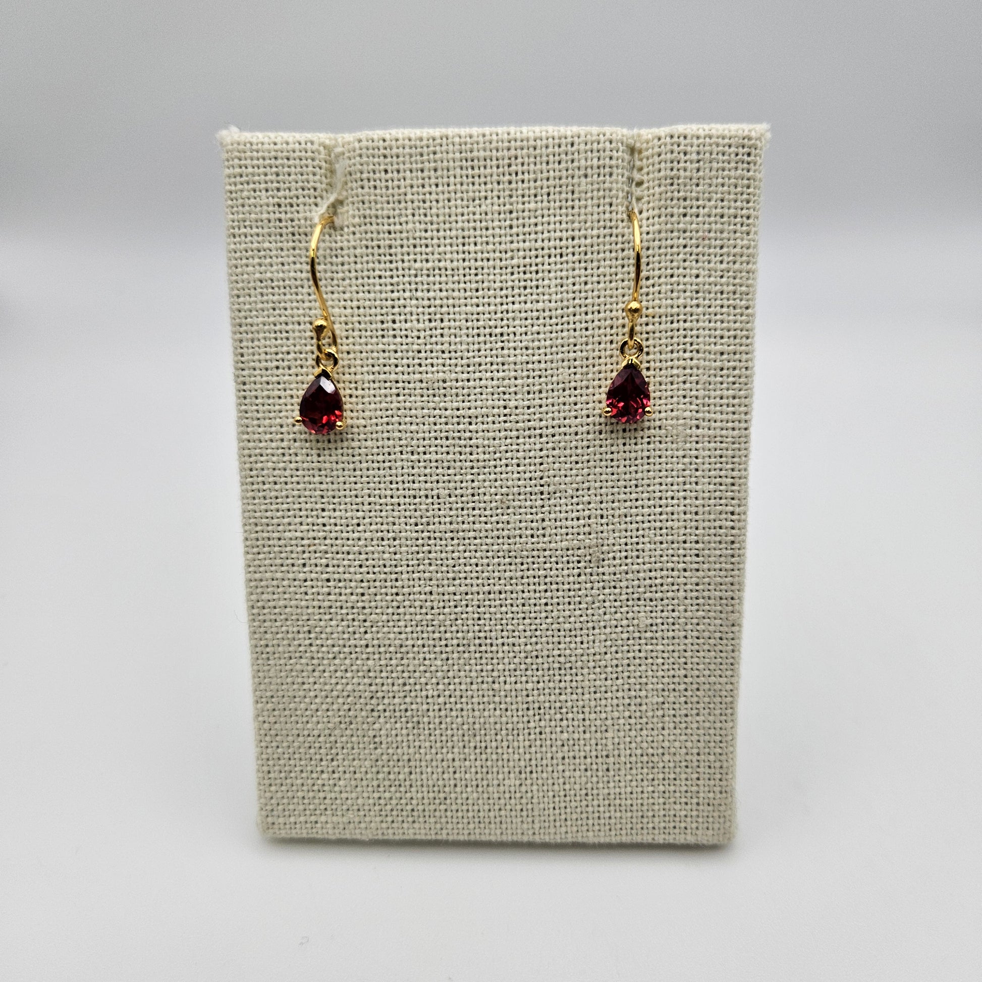 18k Gold Plated Sterling Silver Faceted Garnet Dangle Earrings.