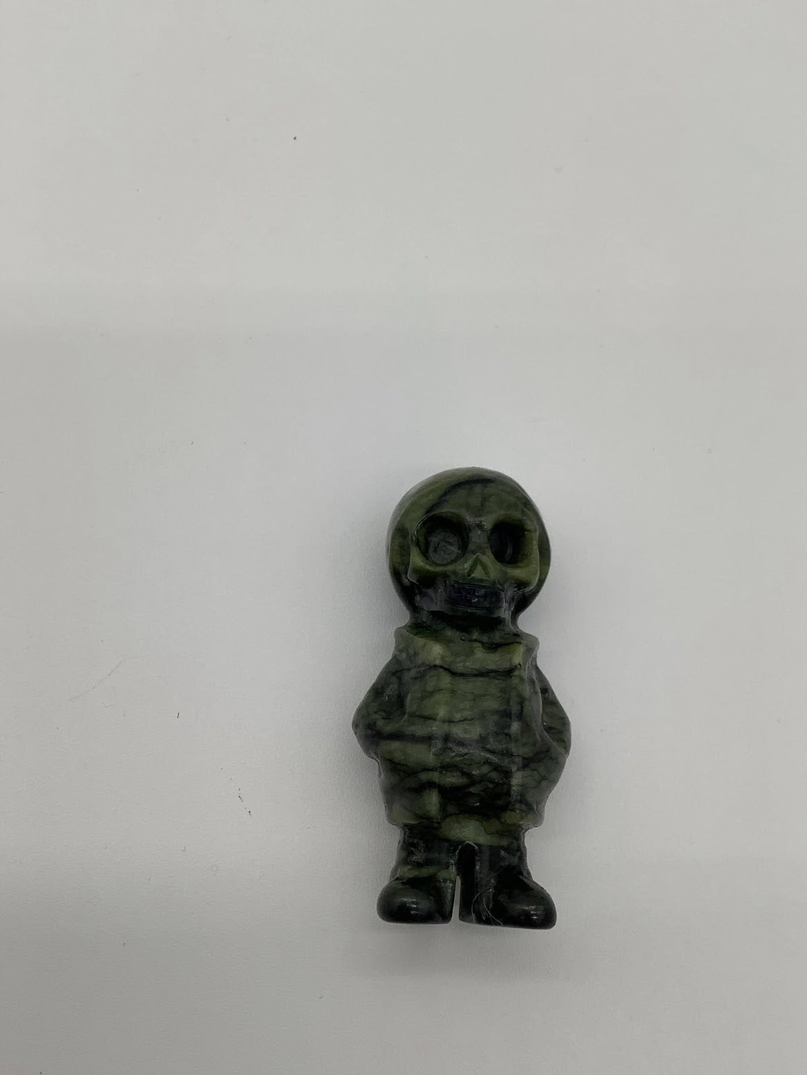 2 inch Seraphinite Skeleton in Hoodie.