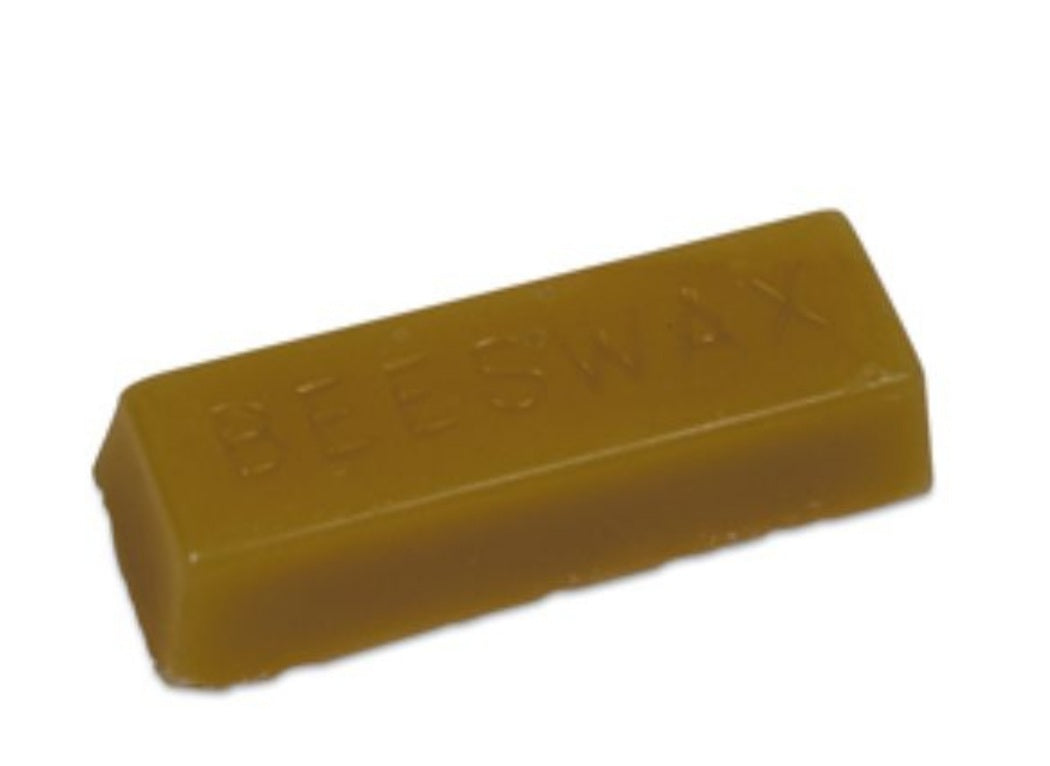 A rectangular bar labeled "BEESWAX - 1 OZ BAR" is displayed on a white background with the word "BEESWAX" embossed on its surface.