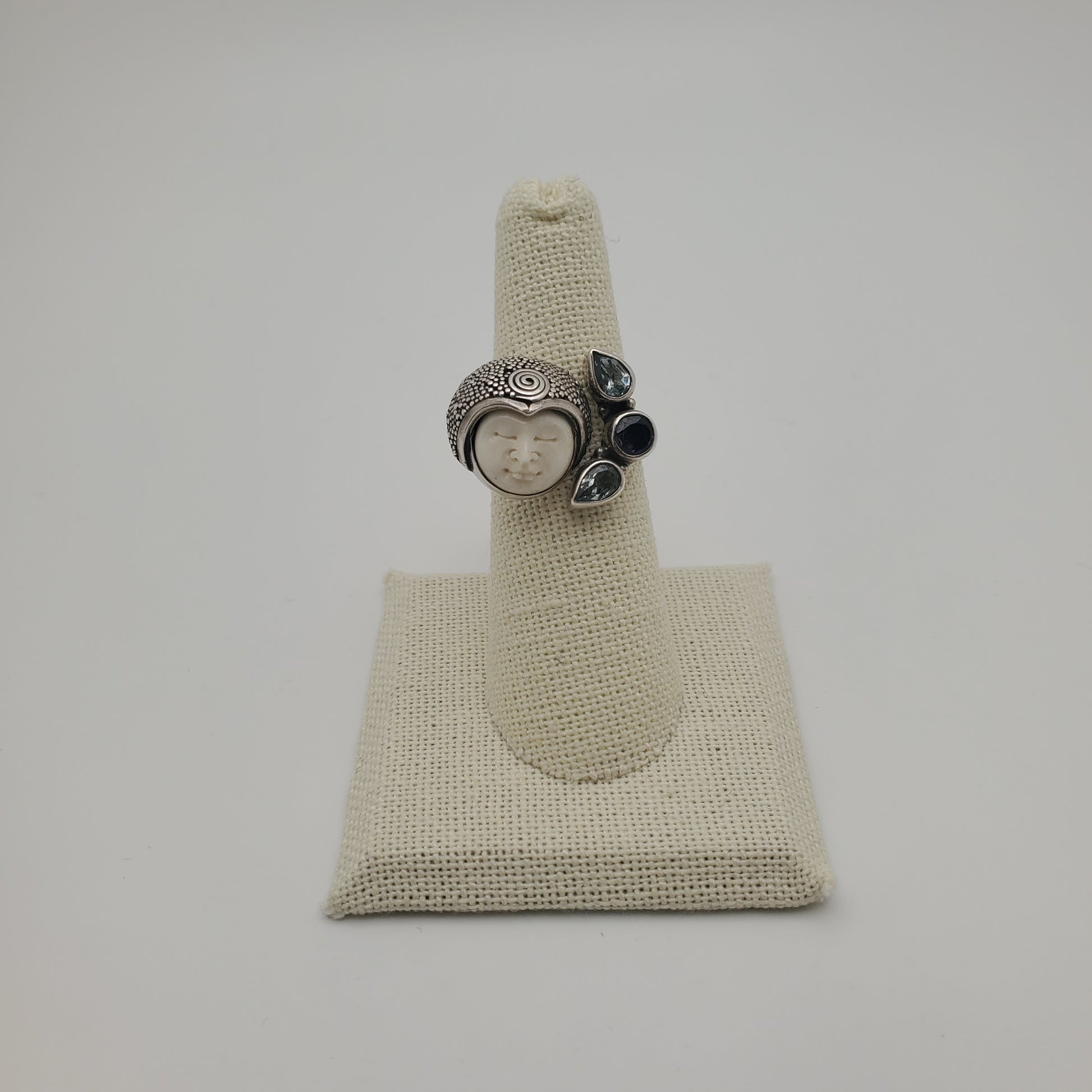 SS Carved Bone Blue Topaz Ring