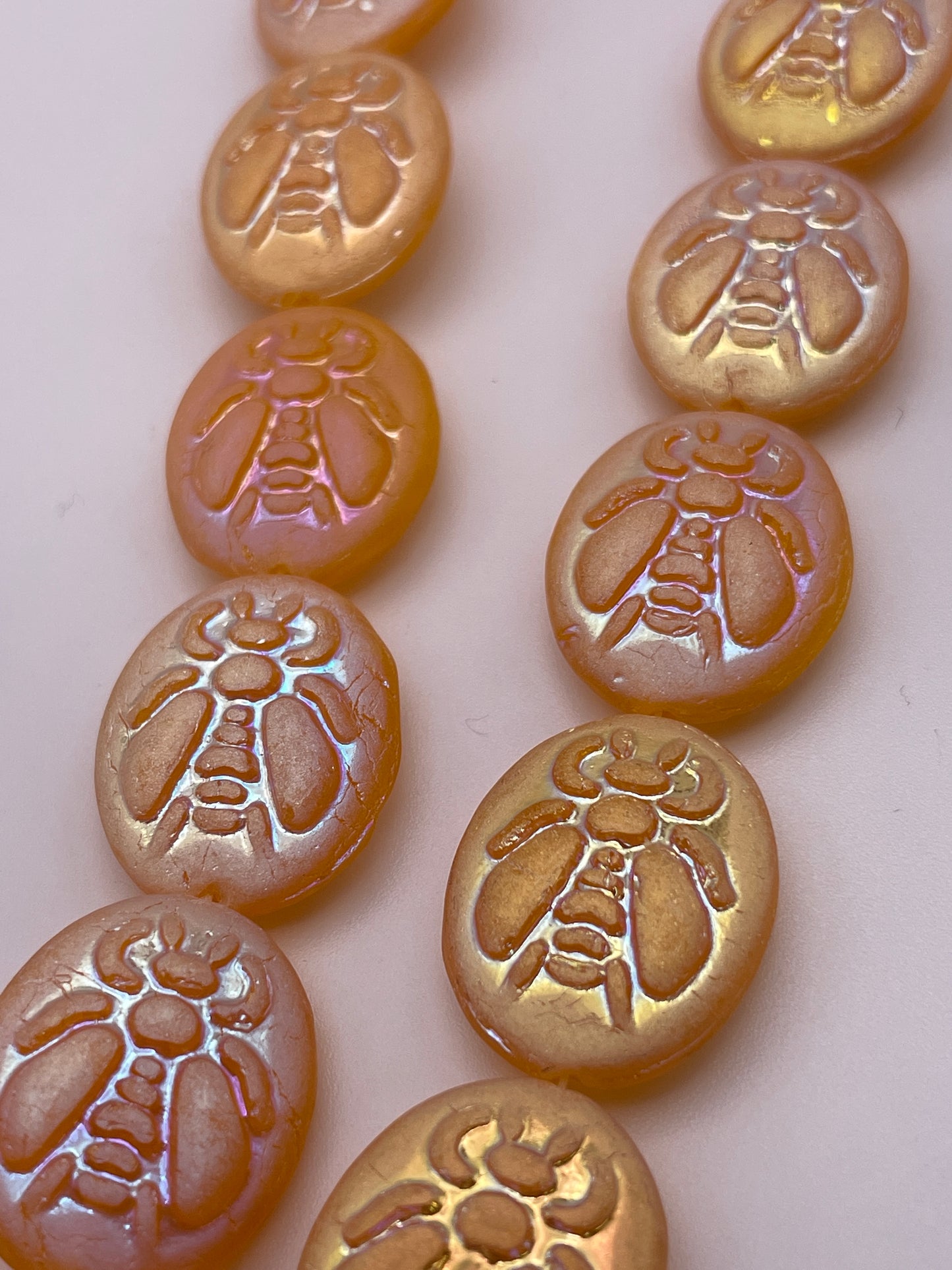 20mm Orange Bee Oval Czech Bead Strand.