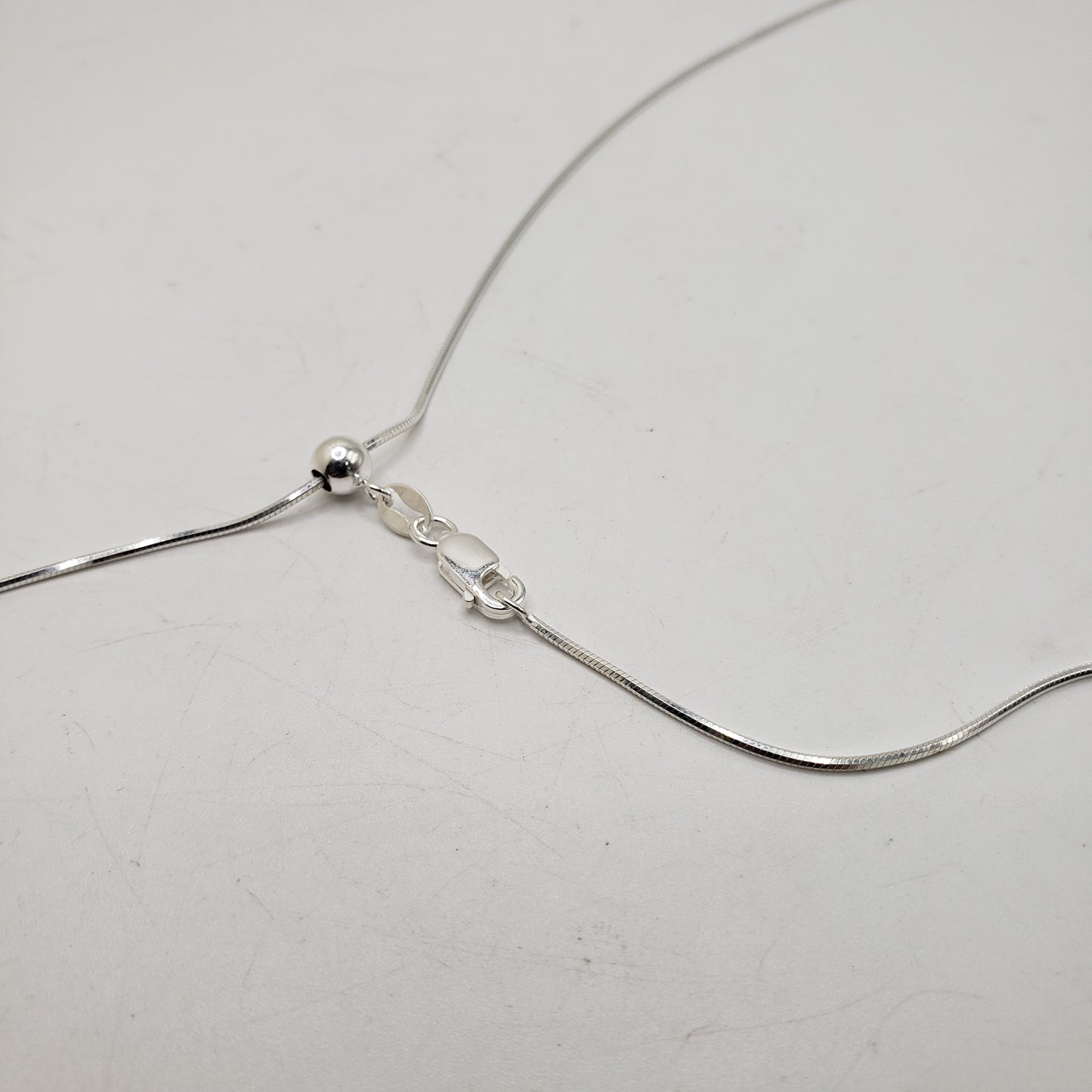 22in Sterling Silver Small Snake Chain Adjustable.