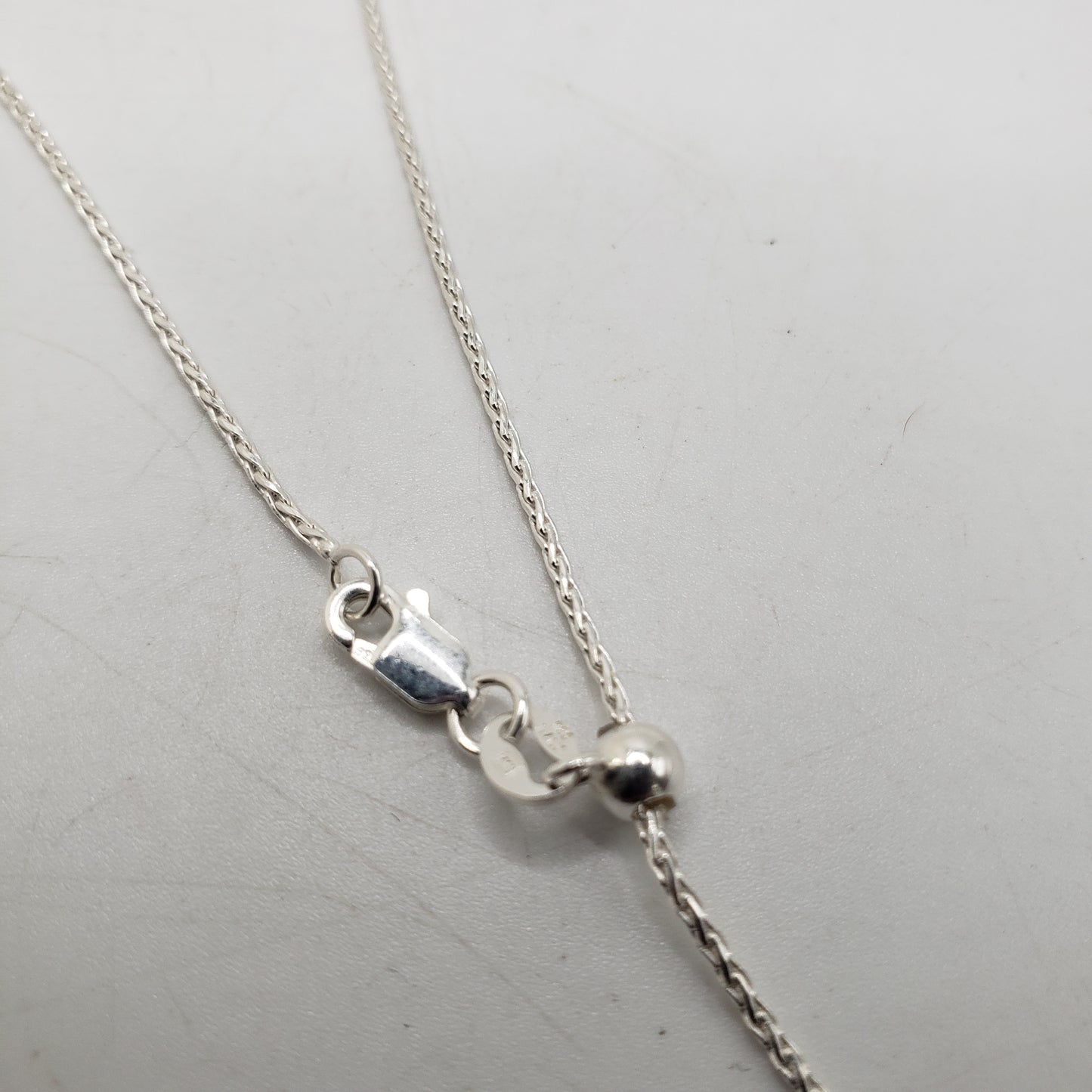 22in Sterling Silver Wheat Chain Adjustable.