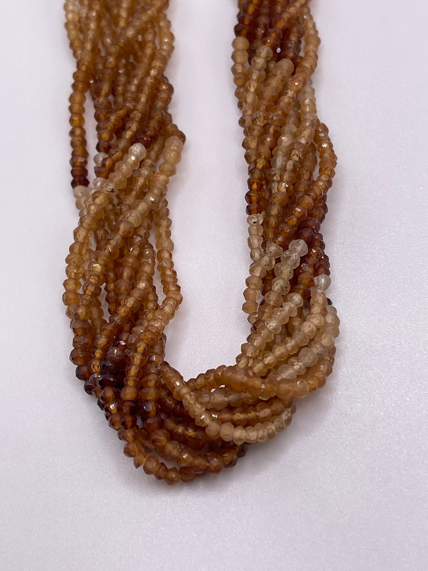 2mm Ombre Shaded Faceted Hessonite Garnet Bead Strand.