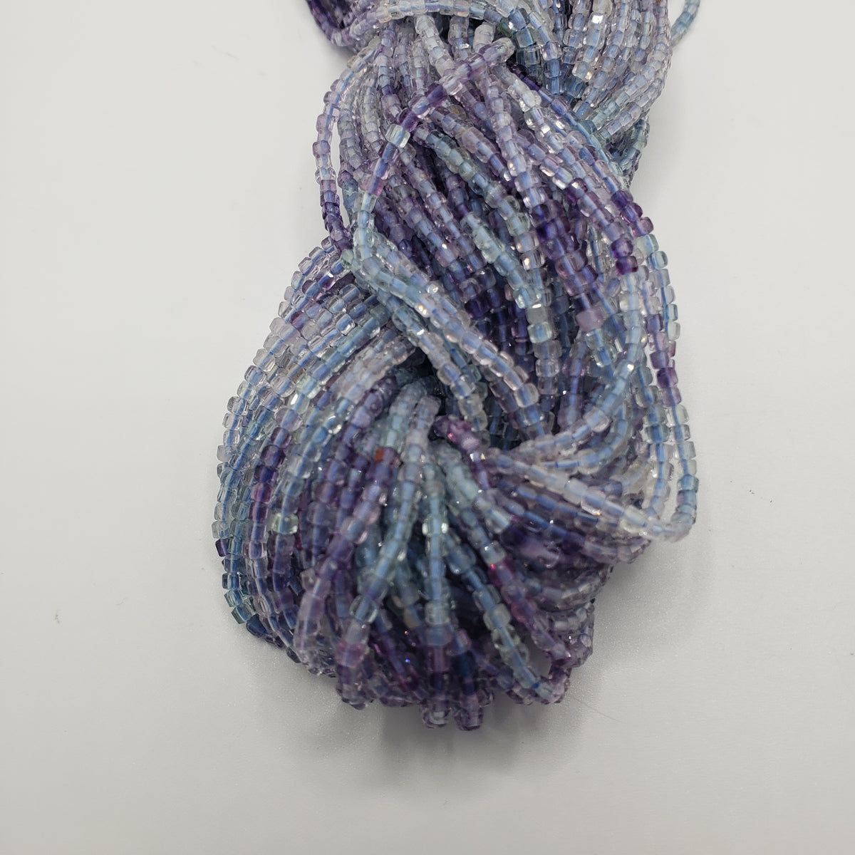 2mm Pastel Blue and Purple Fluorite Faceted Bead Strand.