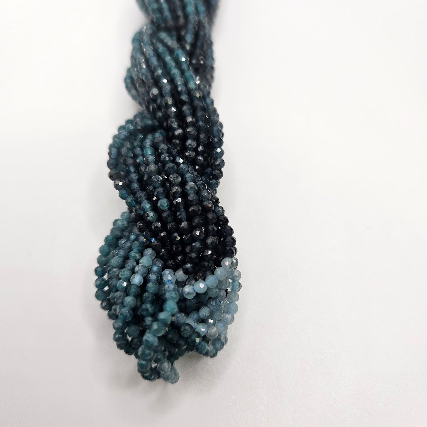 2mm Grandidierite Ombre Faceted Strand.