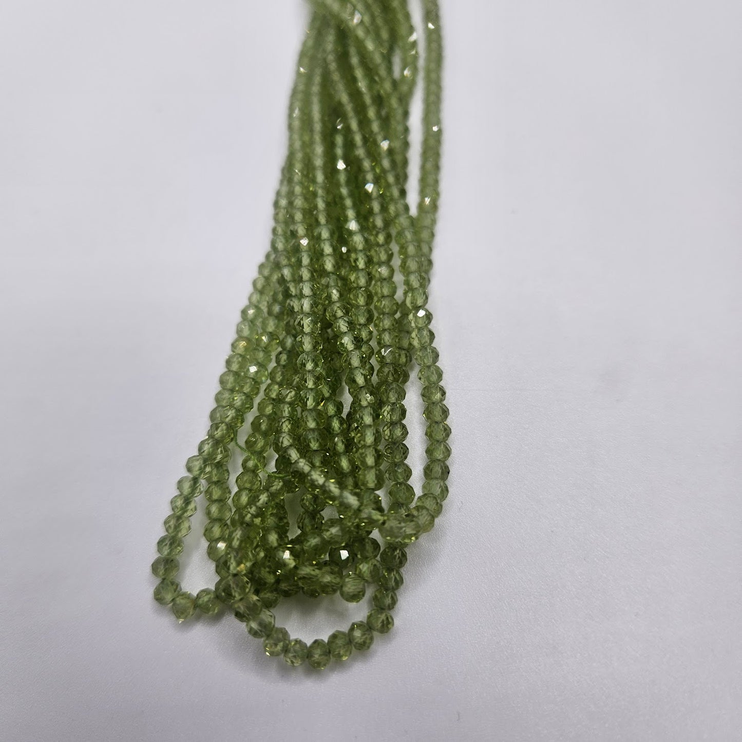 2mm Peridot Faceted Strand.