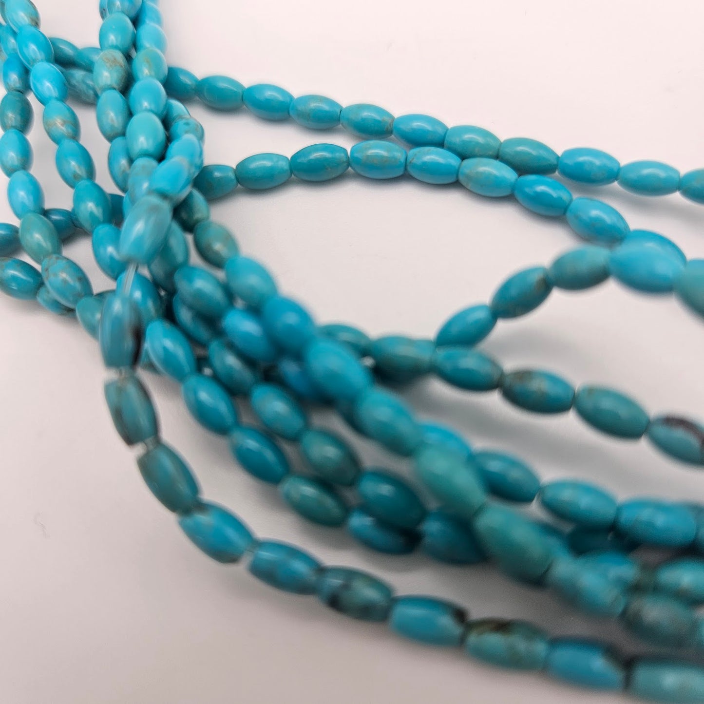 2mm Smooth Tube Turquoise Bead.