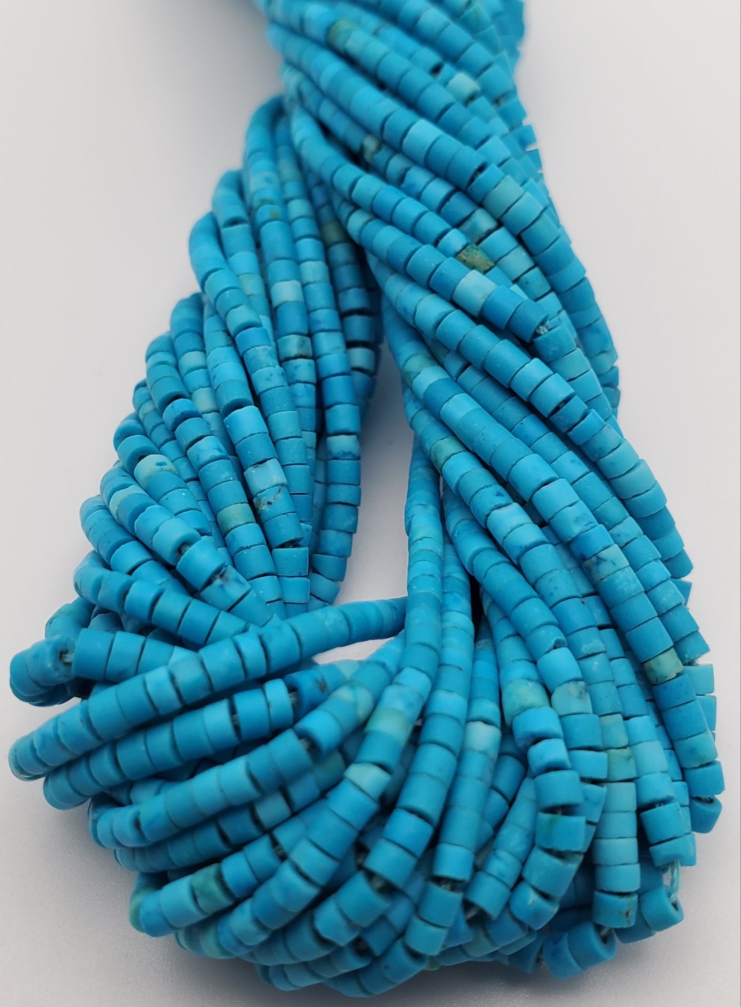 2mm Turquoise Heishi.