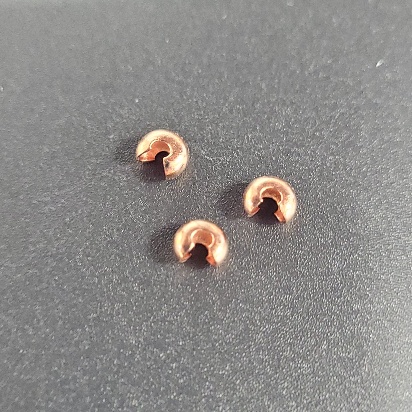 3MM CRIMP BEAD COVER COPPER PLATED.