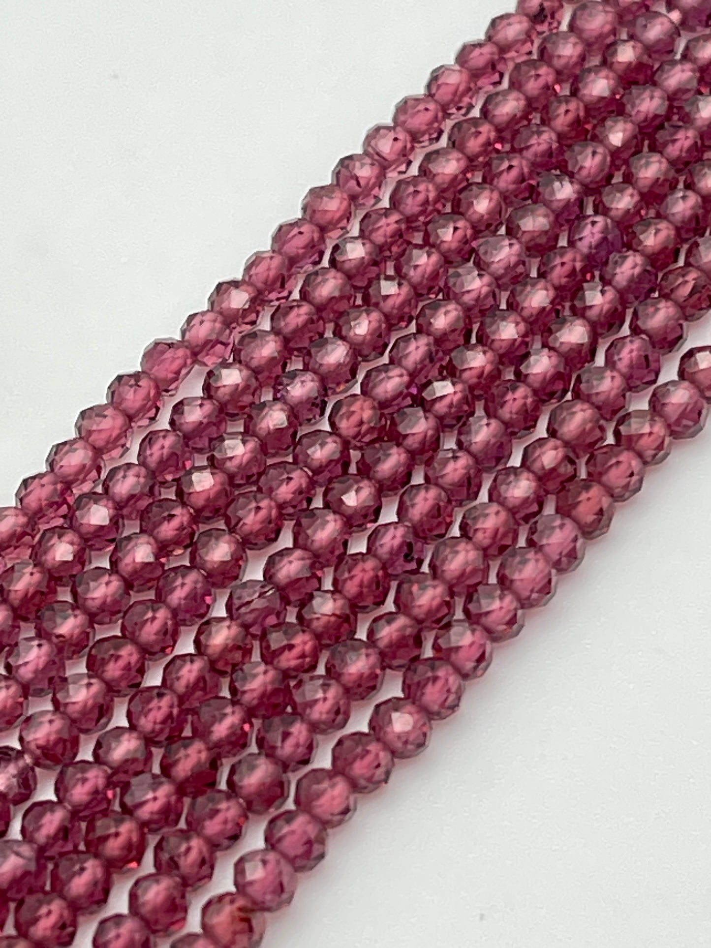3mm Faceted Garnet Round.