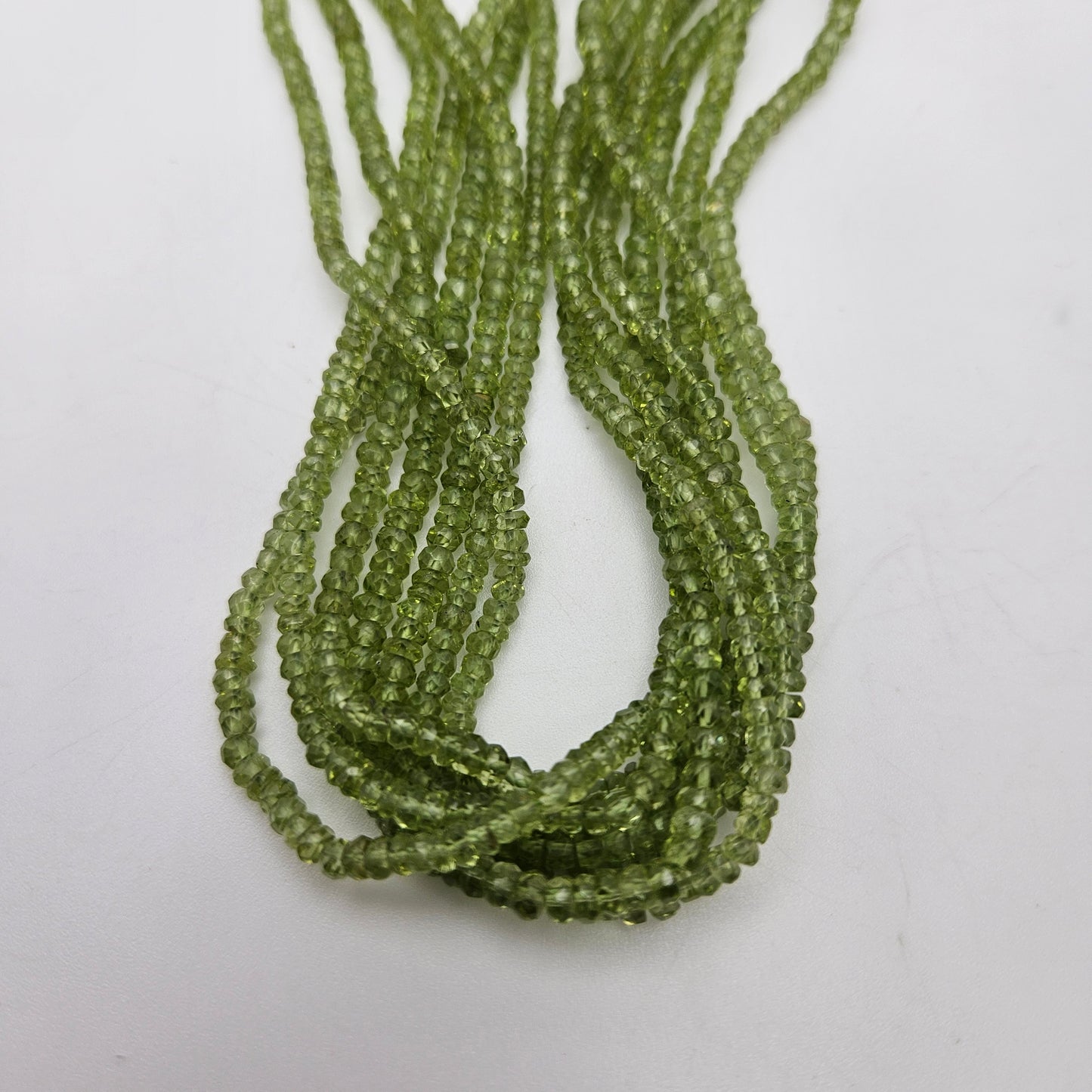 3mm Peridot Rondelle Faceted Bead Strand.