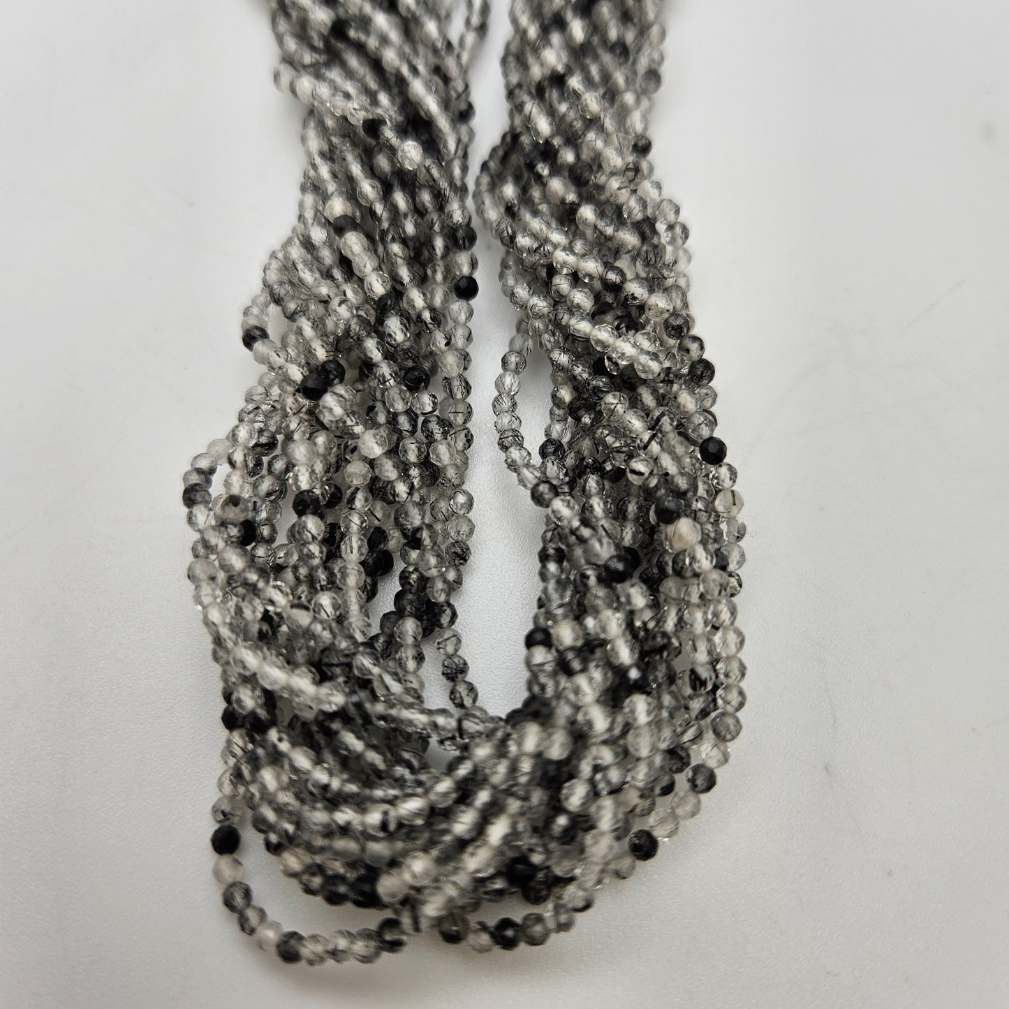 3mm Tourmalated Quartz Round Faceted.