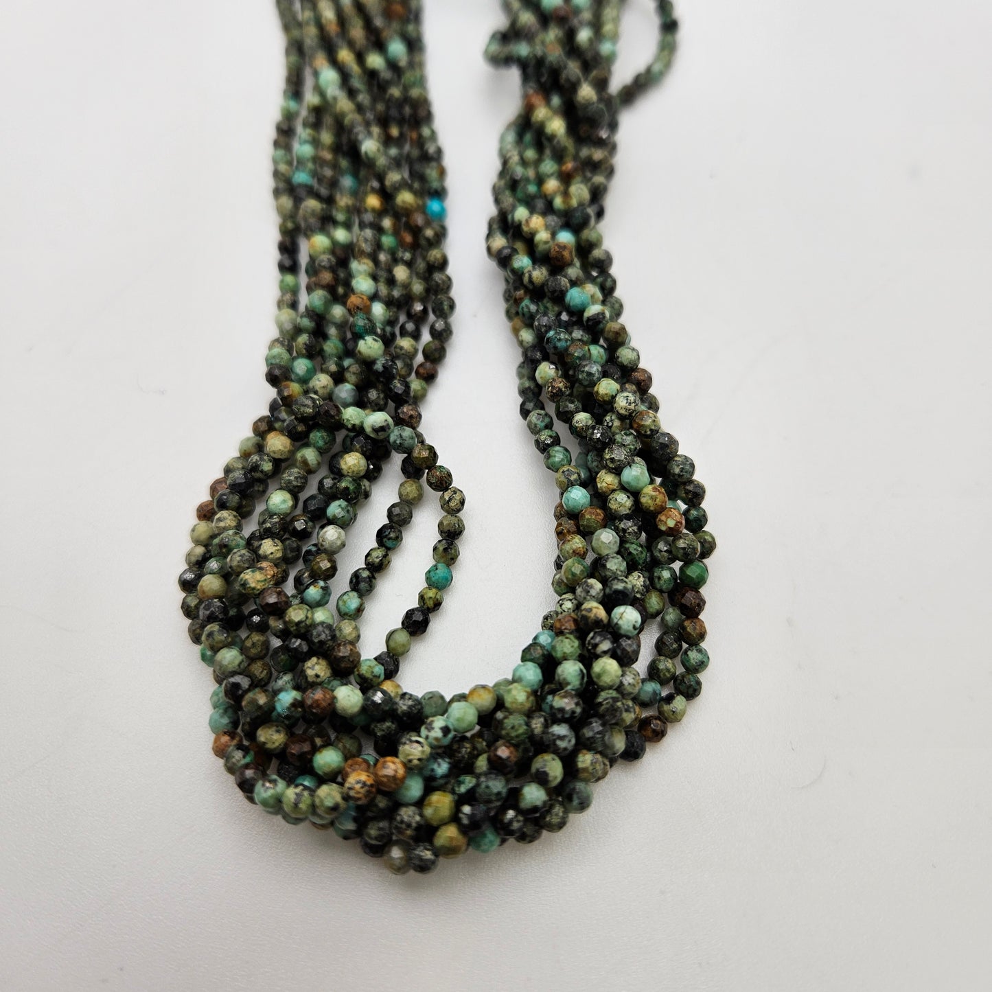 3mm Turquoise Round Faceted Bead Strand.