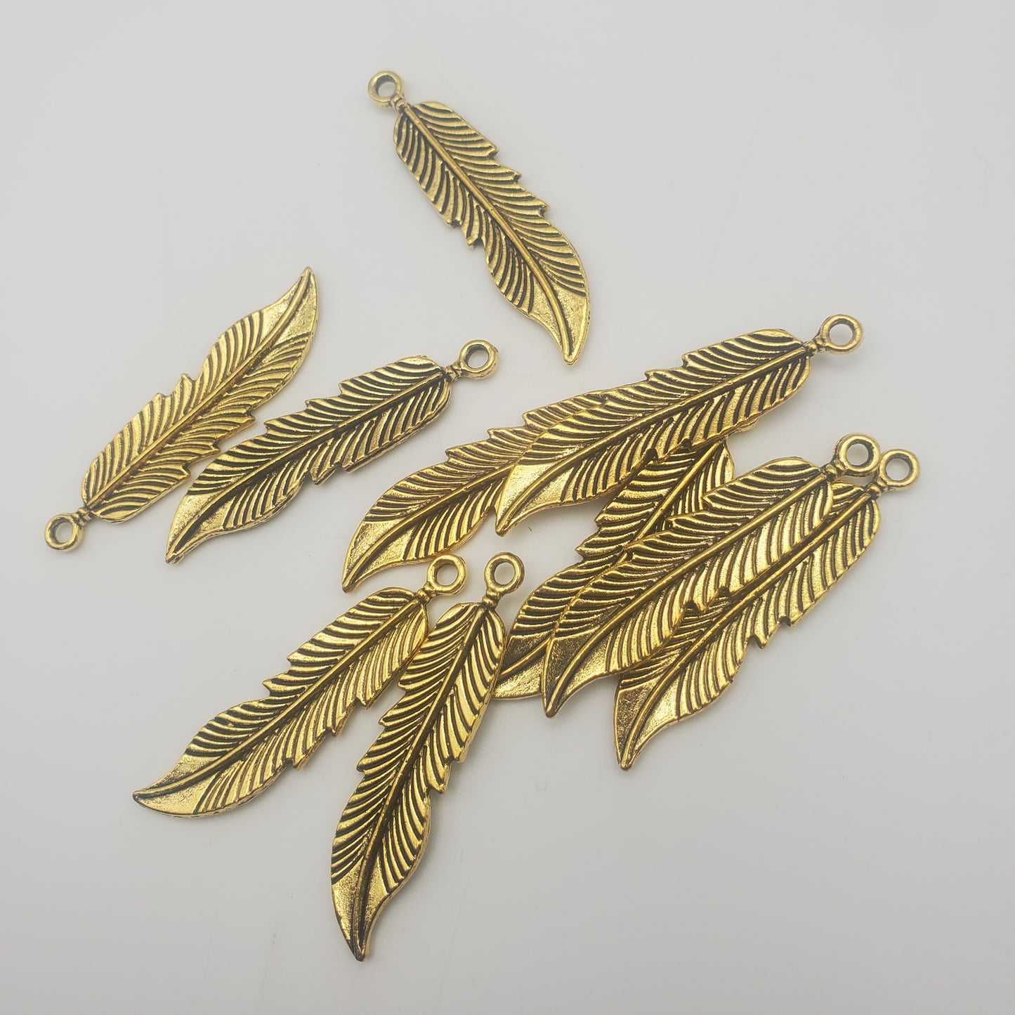 40mm Gold Pewter Feather Charm.