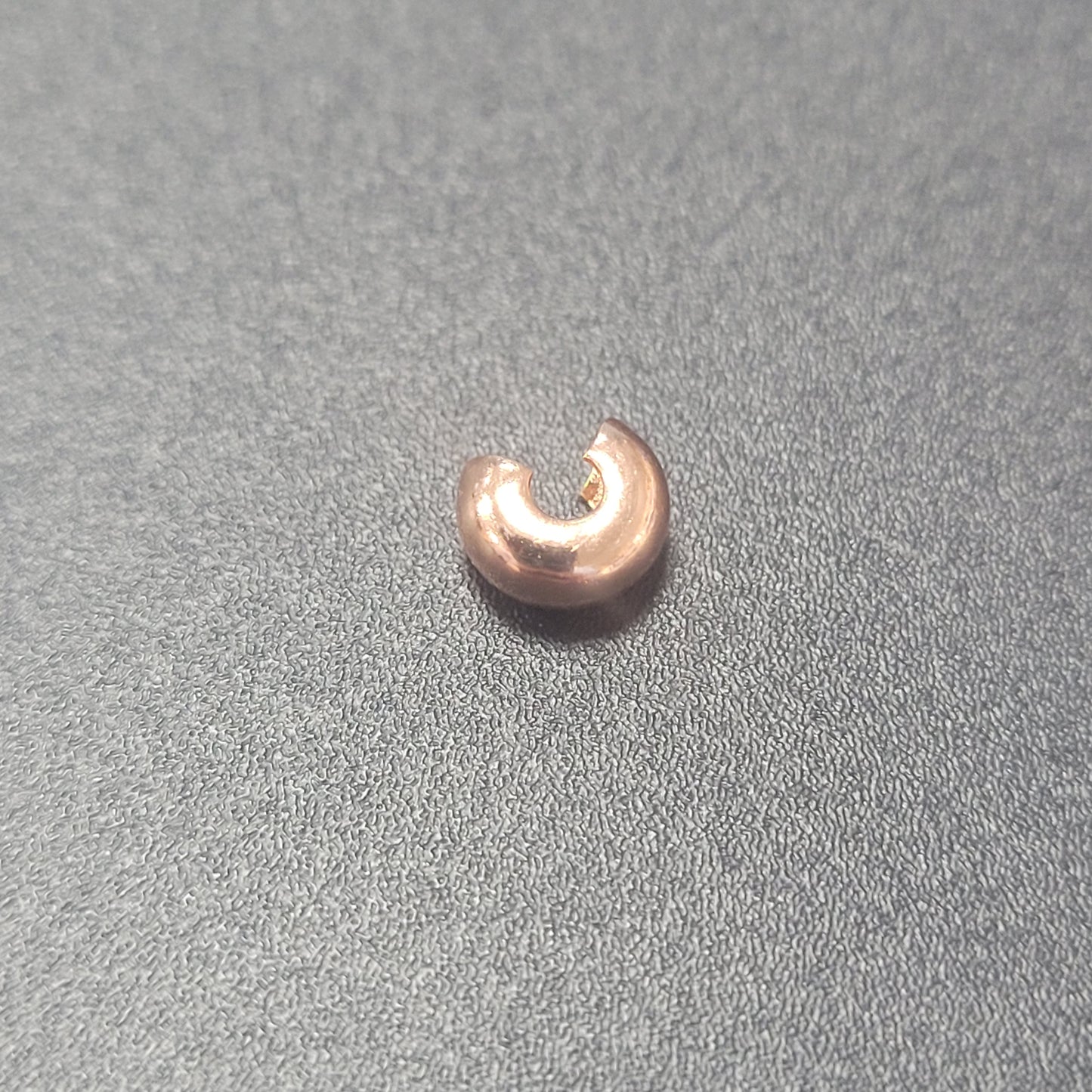 4MM CRIMP BEAD COVER COPPER PLATED SOLD INDIVIDUALLY.