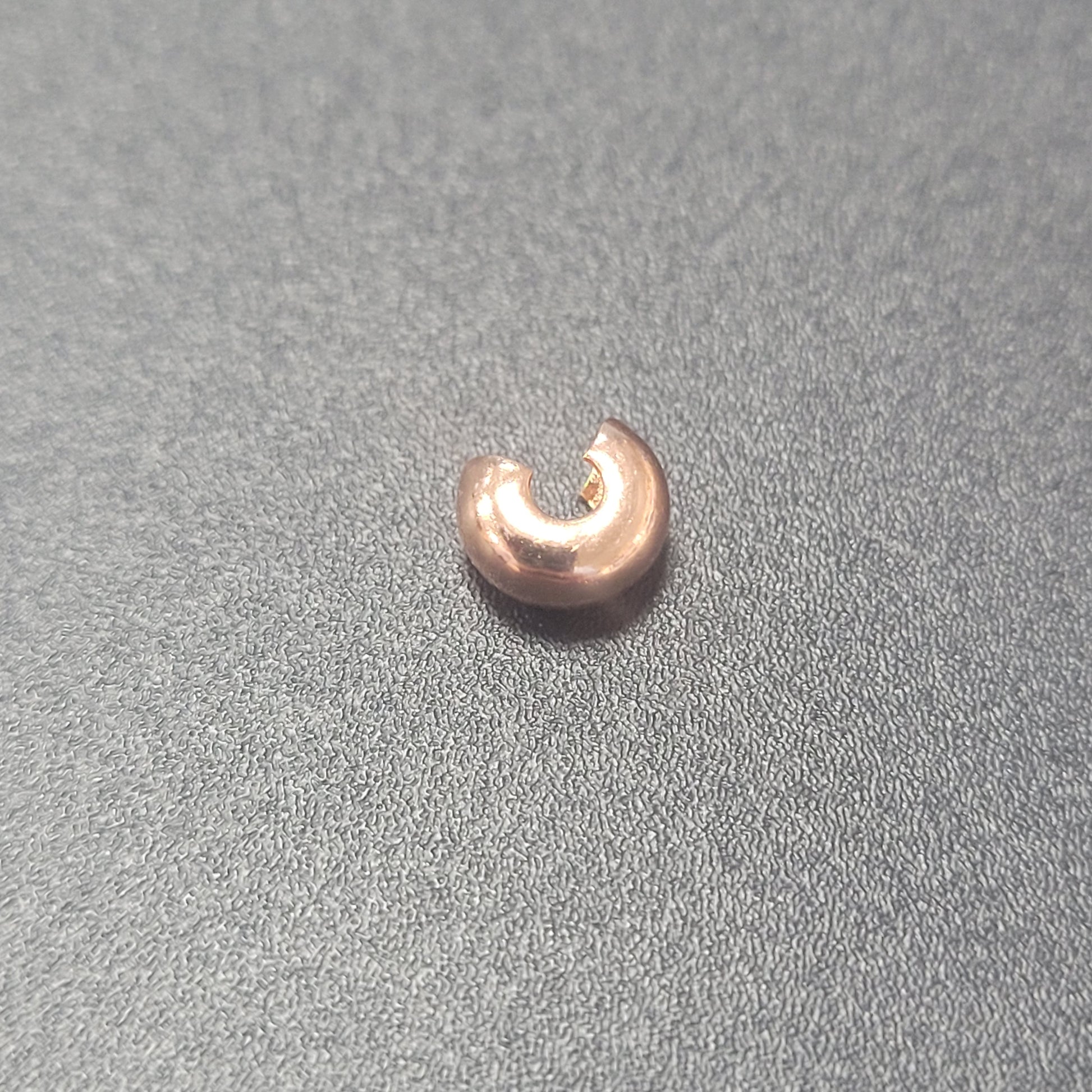 4MM CRIMP BEAD COVER COPPER PLATED SOLD INDIVIDUALLY.