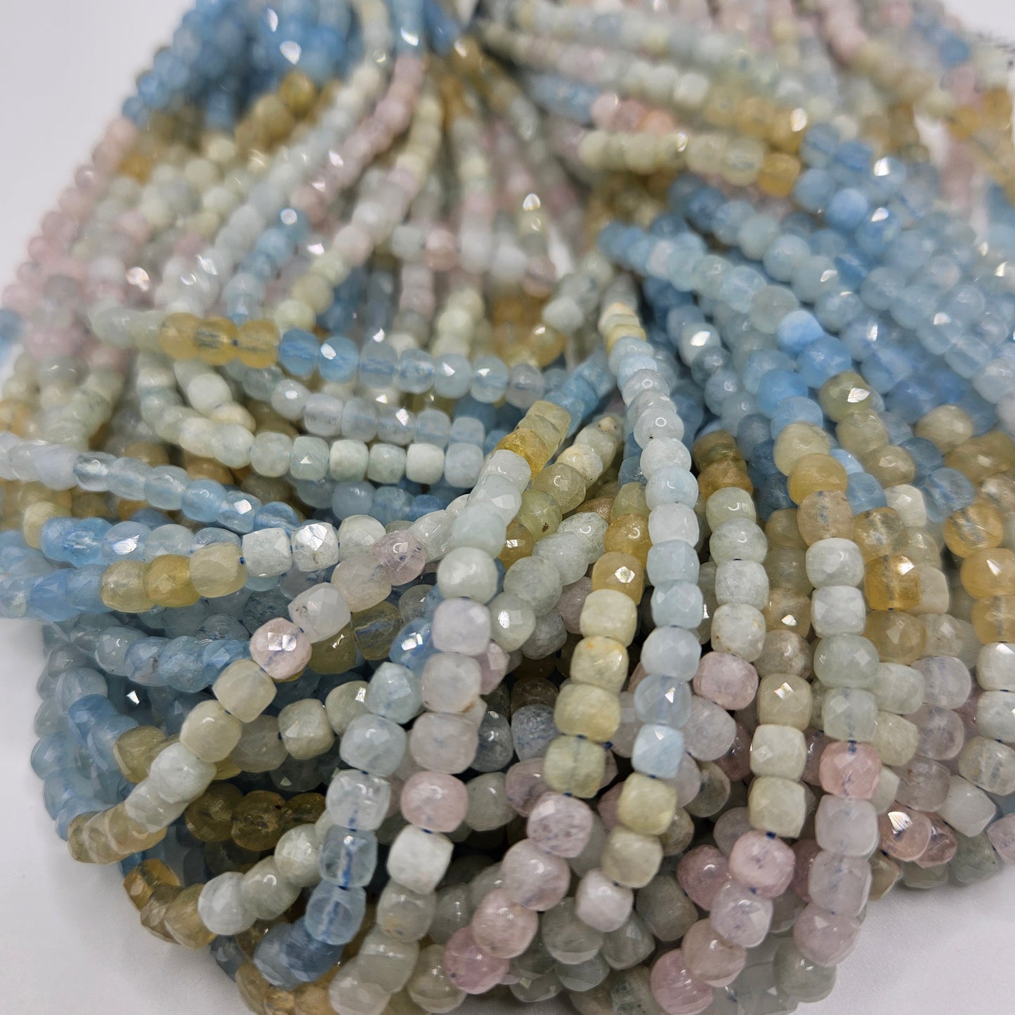 4mm Aquamarine Faceted Cube Bead Strand.
