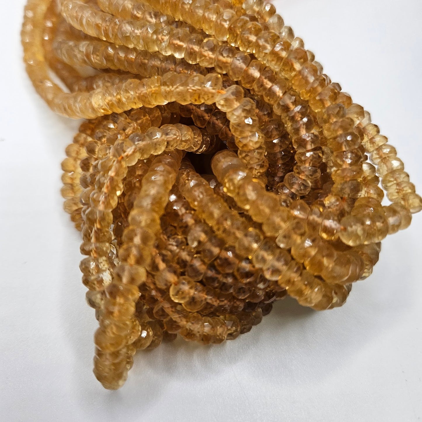 4mm Citrine Faceted Strand.