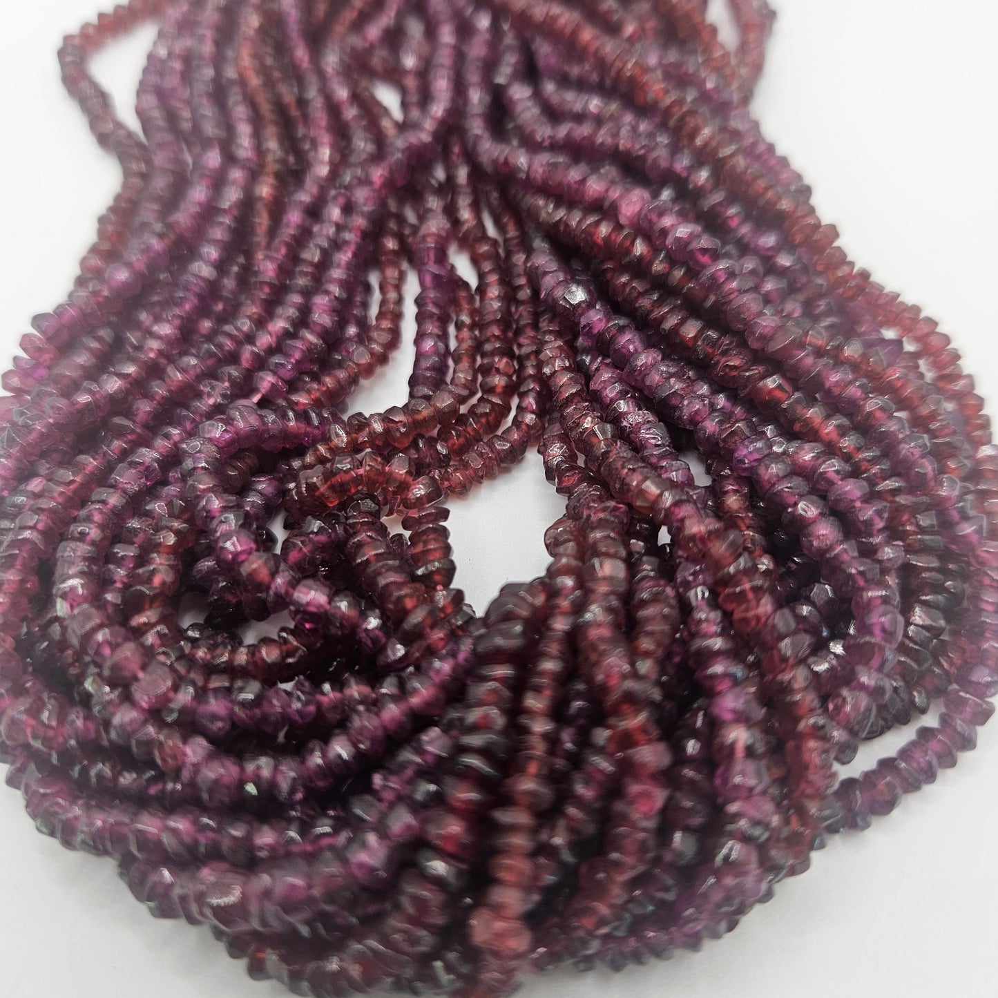 4mm faceted garnet rondelle bead strand.