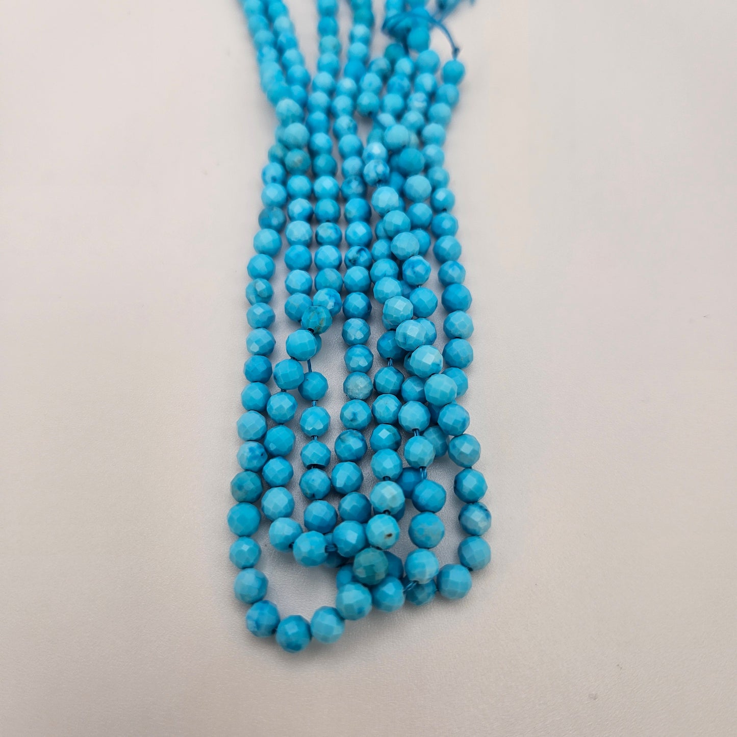 4mm Howlite Faceted Dyed Round Bead Strand.