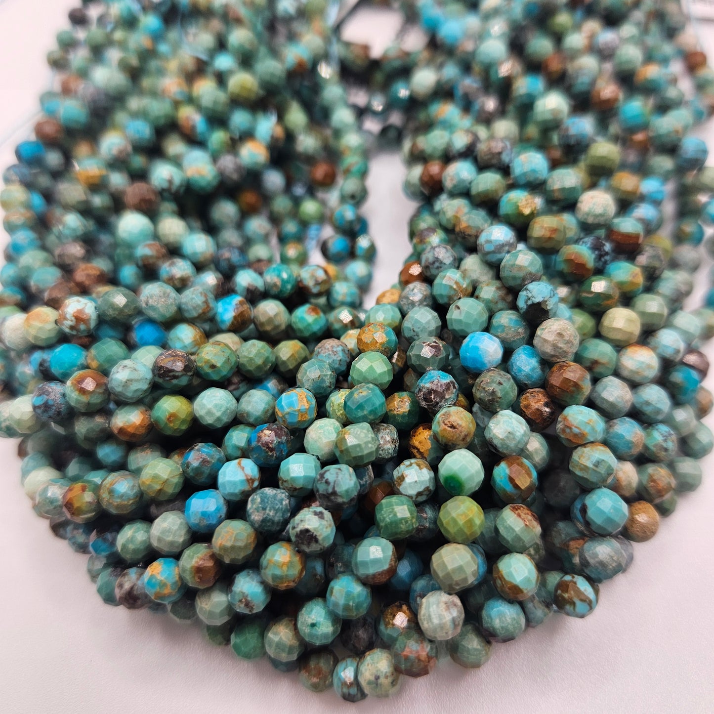 5mm Turquoise Faceted Round Bead Strand.