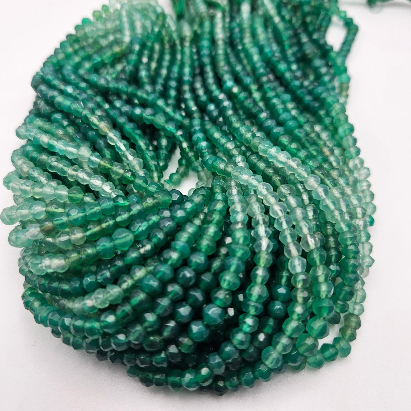 5mm Ombre Green Onyx Faceted Round Bead Strand.