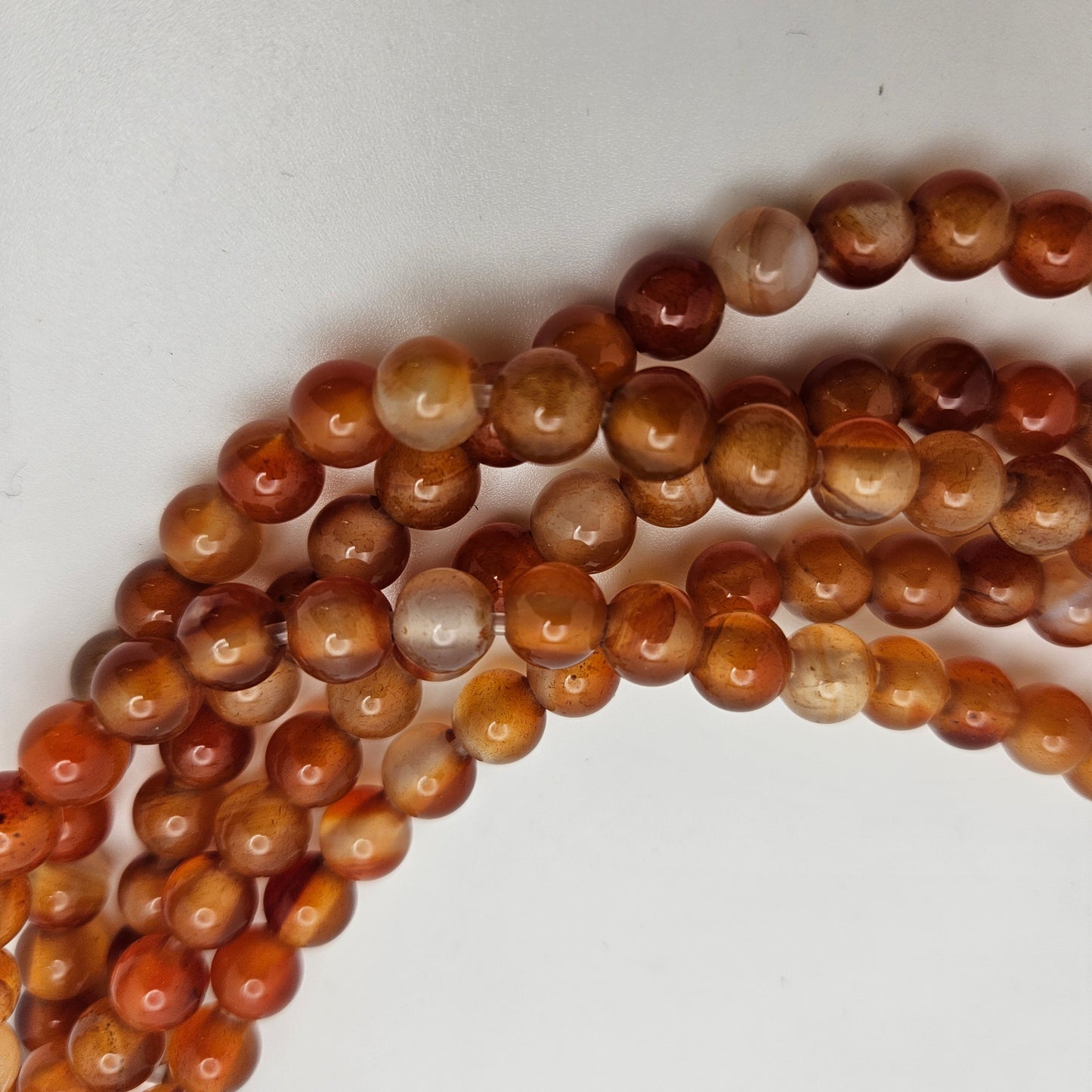 6mm Carnelian Large Hole Round Bead Strand.
