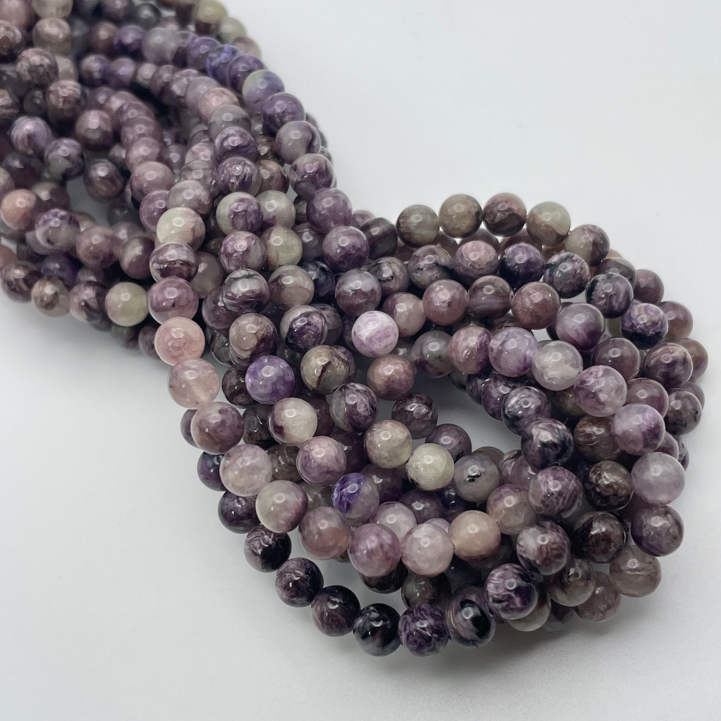 6mm Charoite Round Smooth Bead Strand.