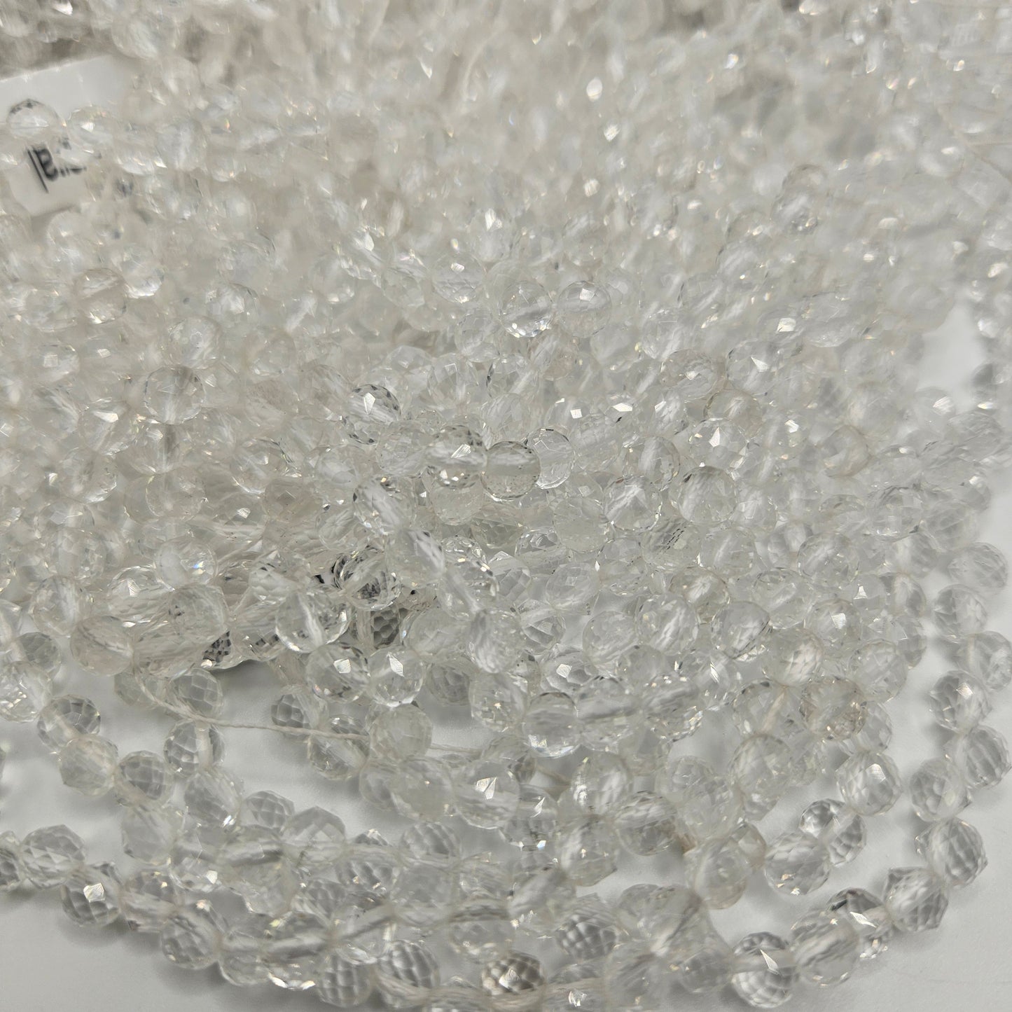 6mm Clear Quartz Faceted Top Drill Bead Strand.