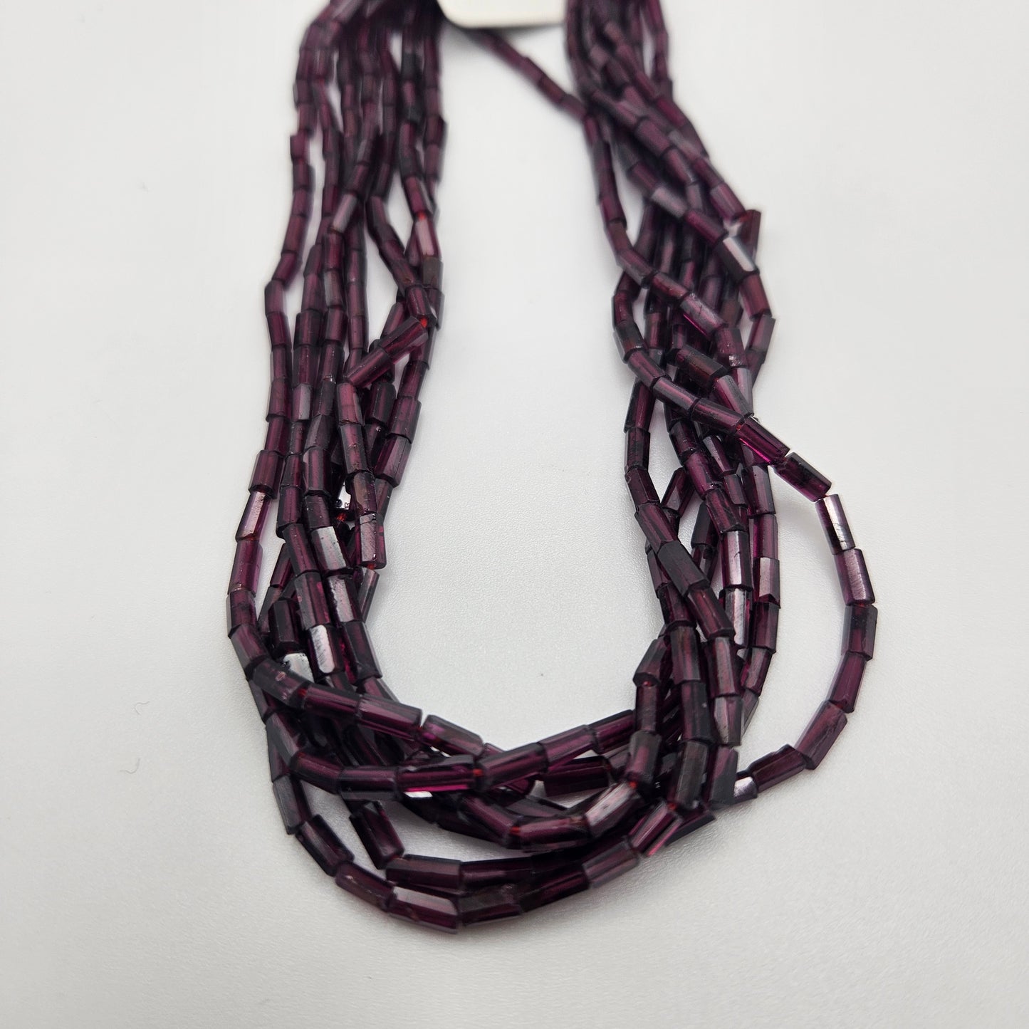 6mm Garnet Faceted Tube Bead Strand.