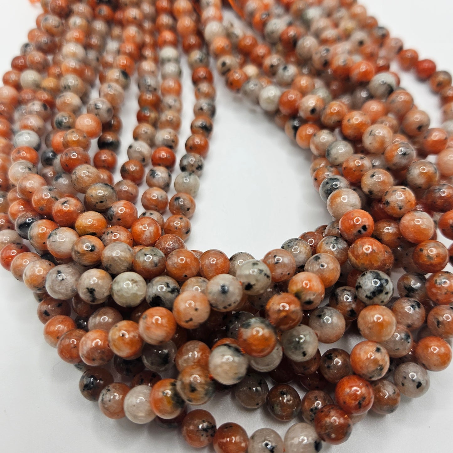 6mm Orange Calcite Round Bead Strand.