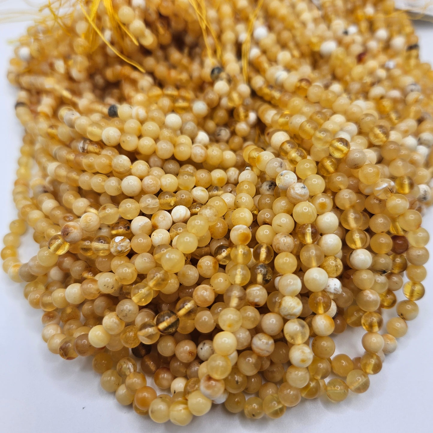 6mm Yellow Amber Round Bead Strand.