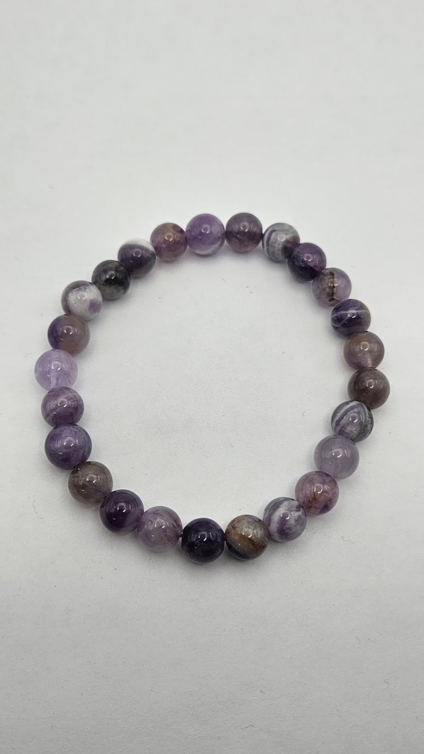 8mm Amethyst Dog tooth Stretch Bracelet.