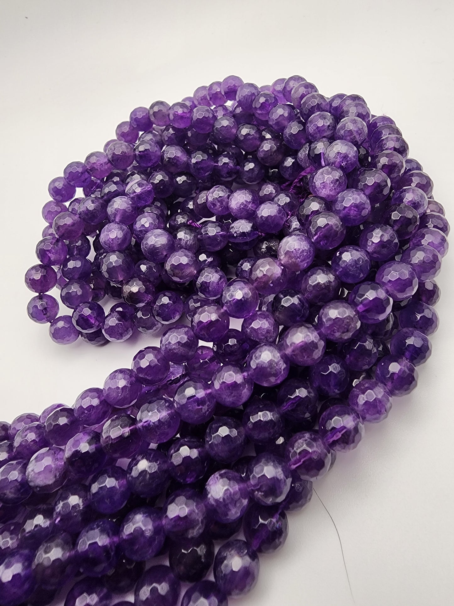 8mm Amethyst Faceted Bead Strand.