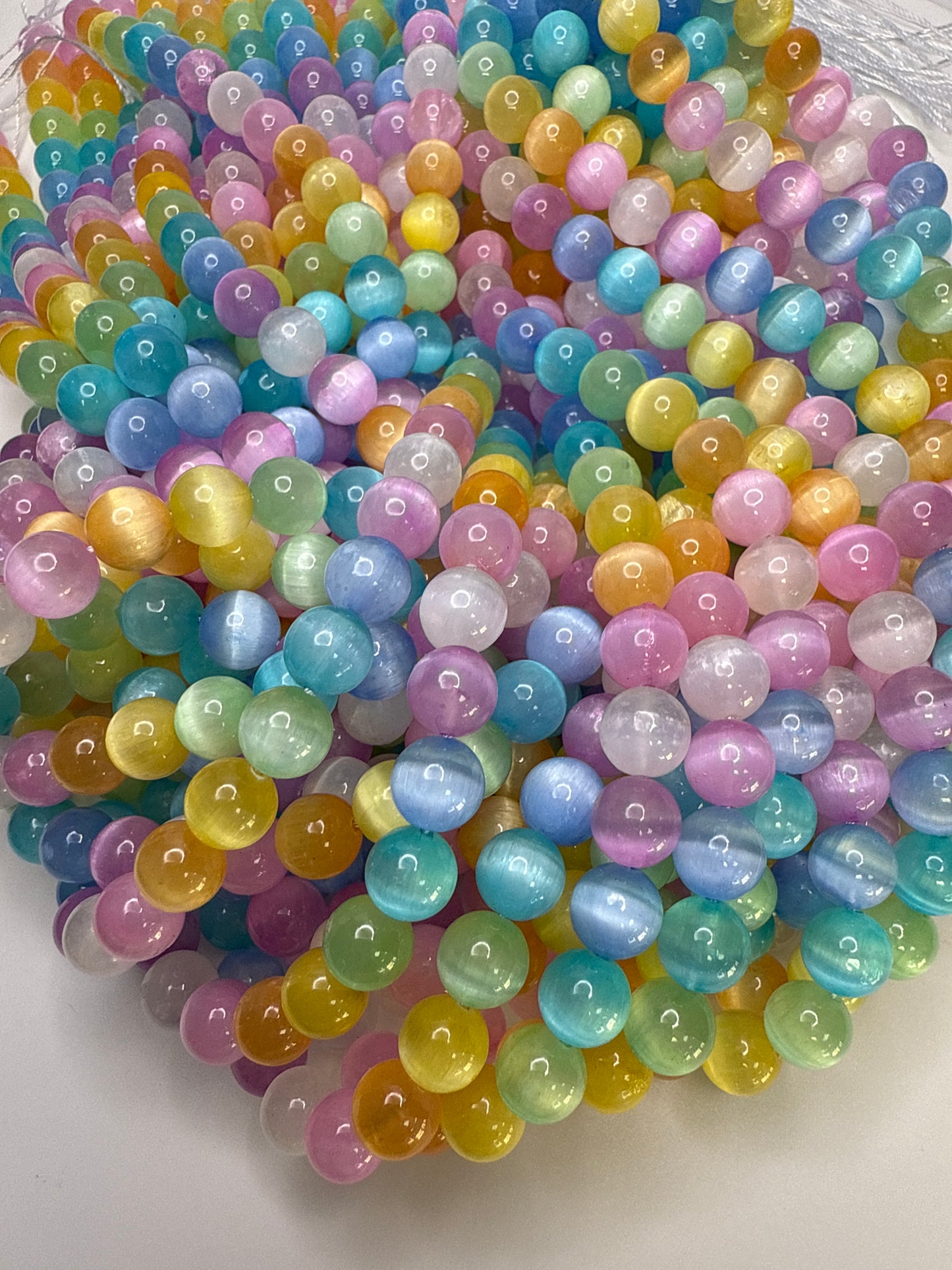 8mm Dyed Selenite Candy Smooth Round.