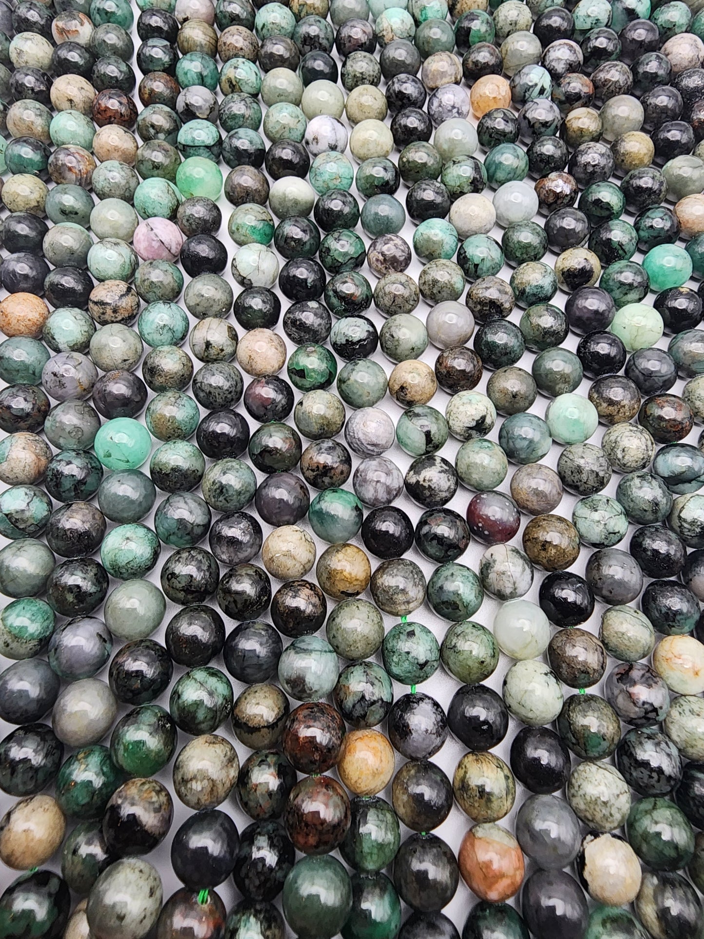 8mm Emerald Round Bead Strand.