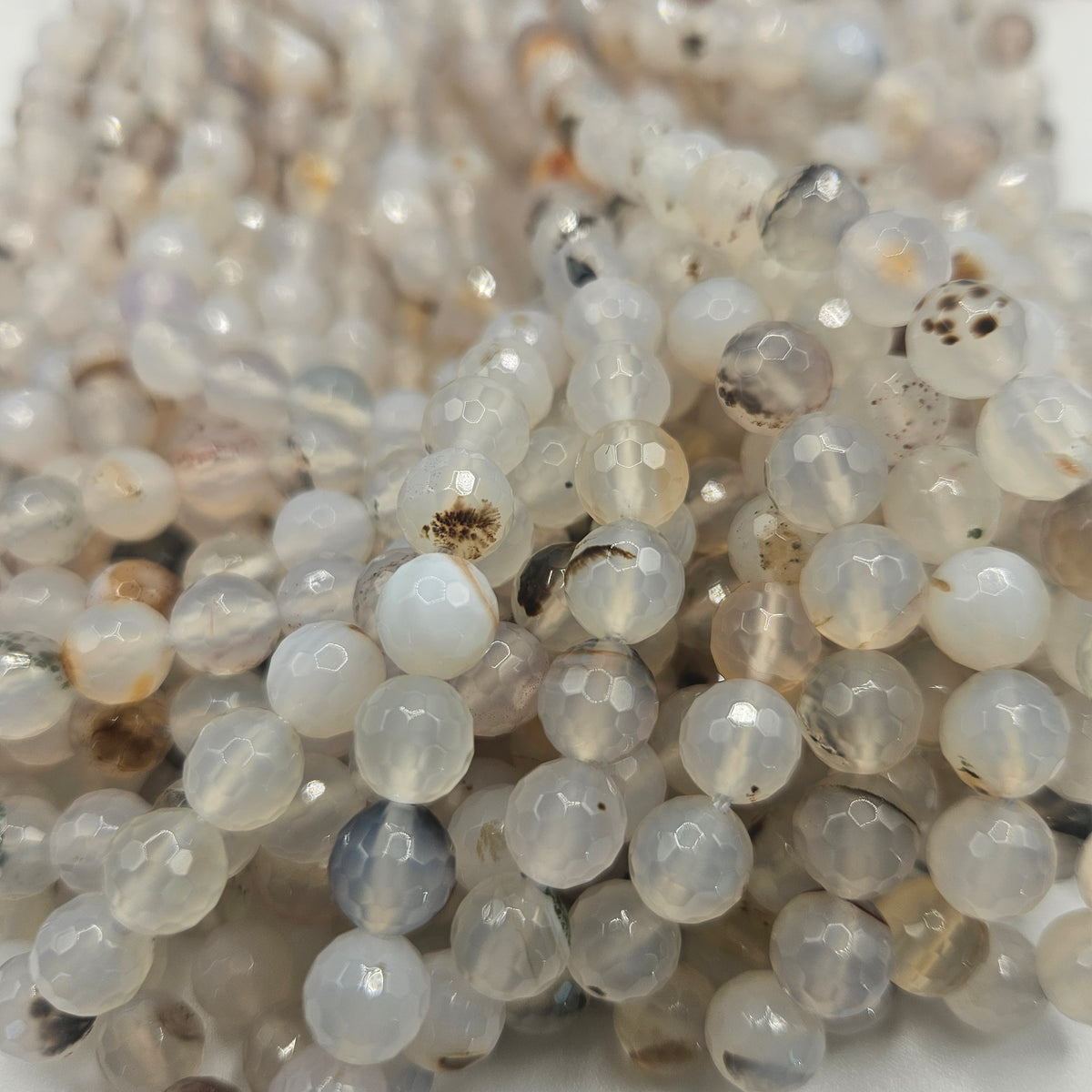 8mm Faceted Montana Agate Bead Strand.